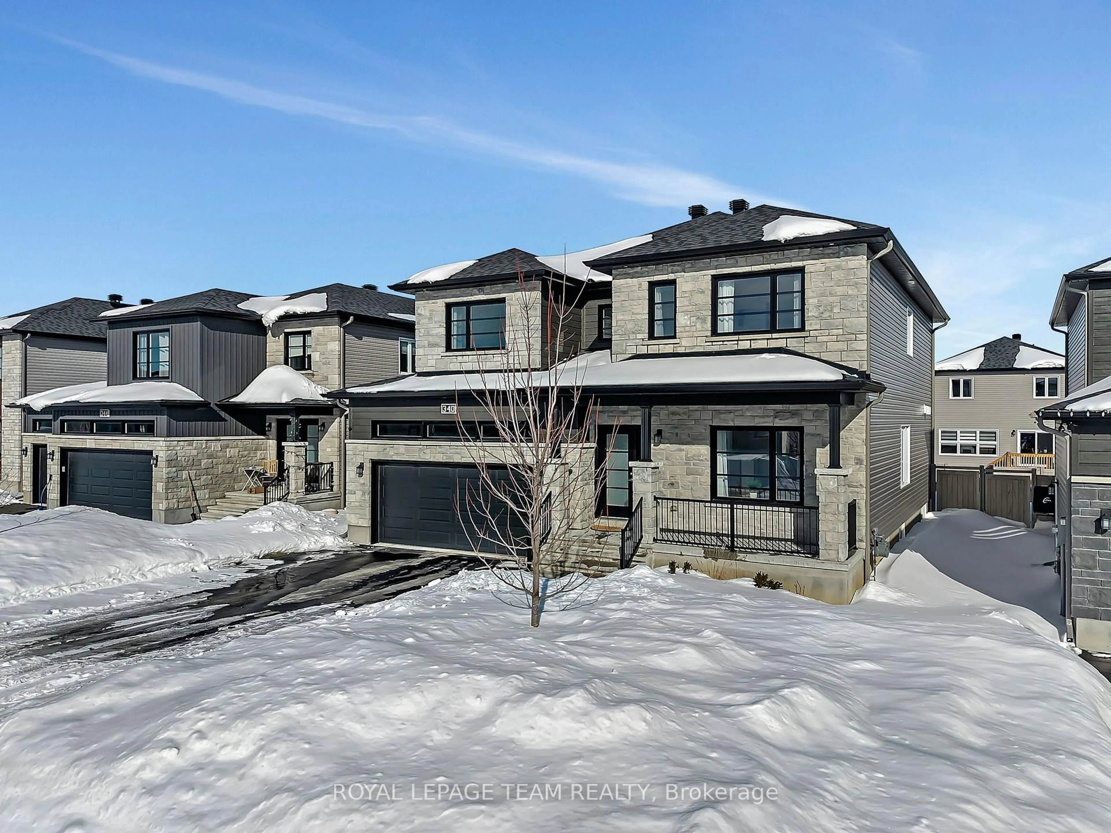 A pic from outside/outdoor area/front of a property/back of a property/a pic from drone, street for 340 Moonlight Dr, Russell Ontario K4R 0L1