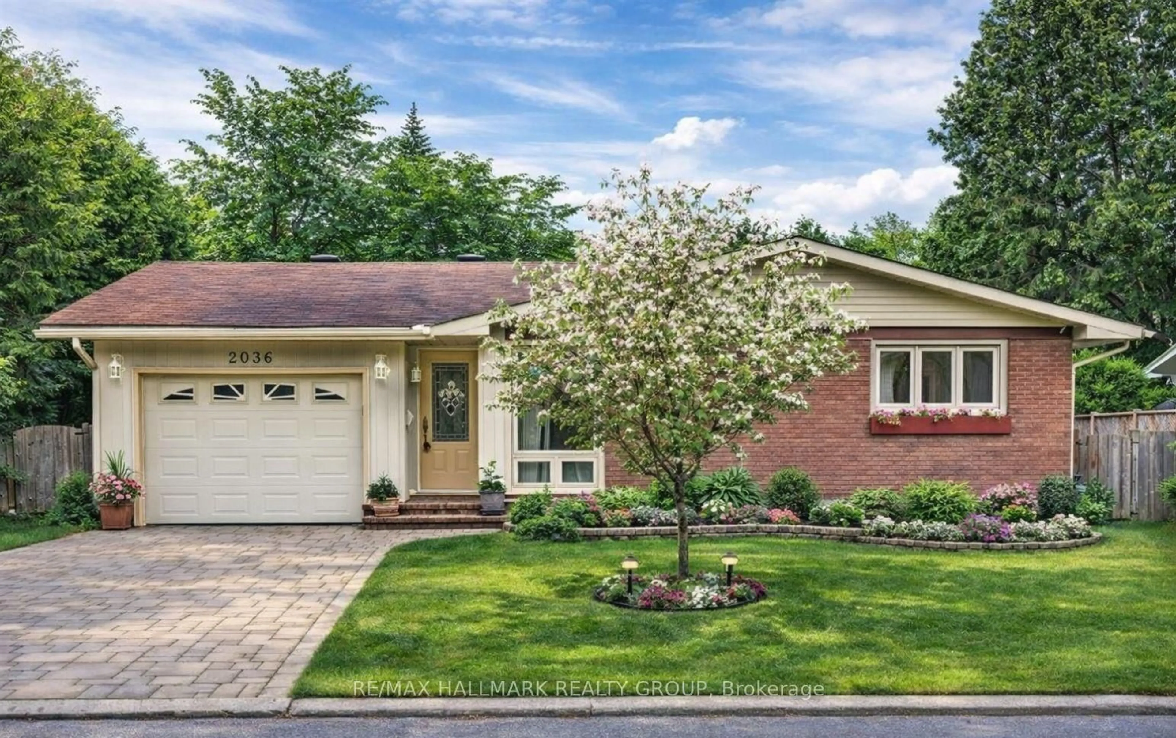 Home with brick exterior material, street for 2036 KINGS GROVE Cres, Ottawa Ontario K1J 6G1