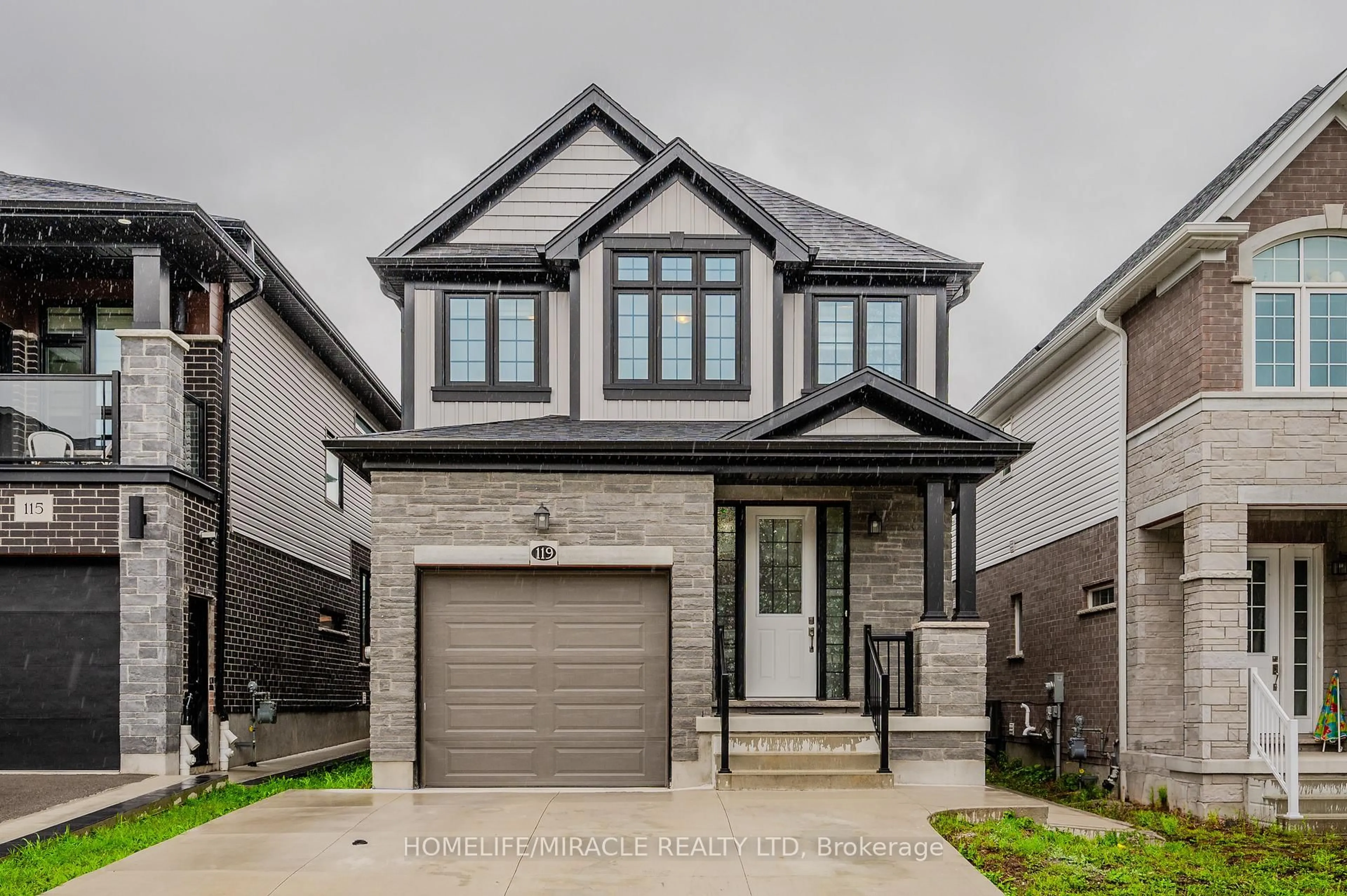 Home with brick exterior material, street for 119 Monarch woods Dr, Kitchener Ontario N2P 0K2