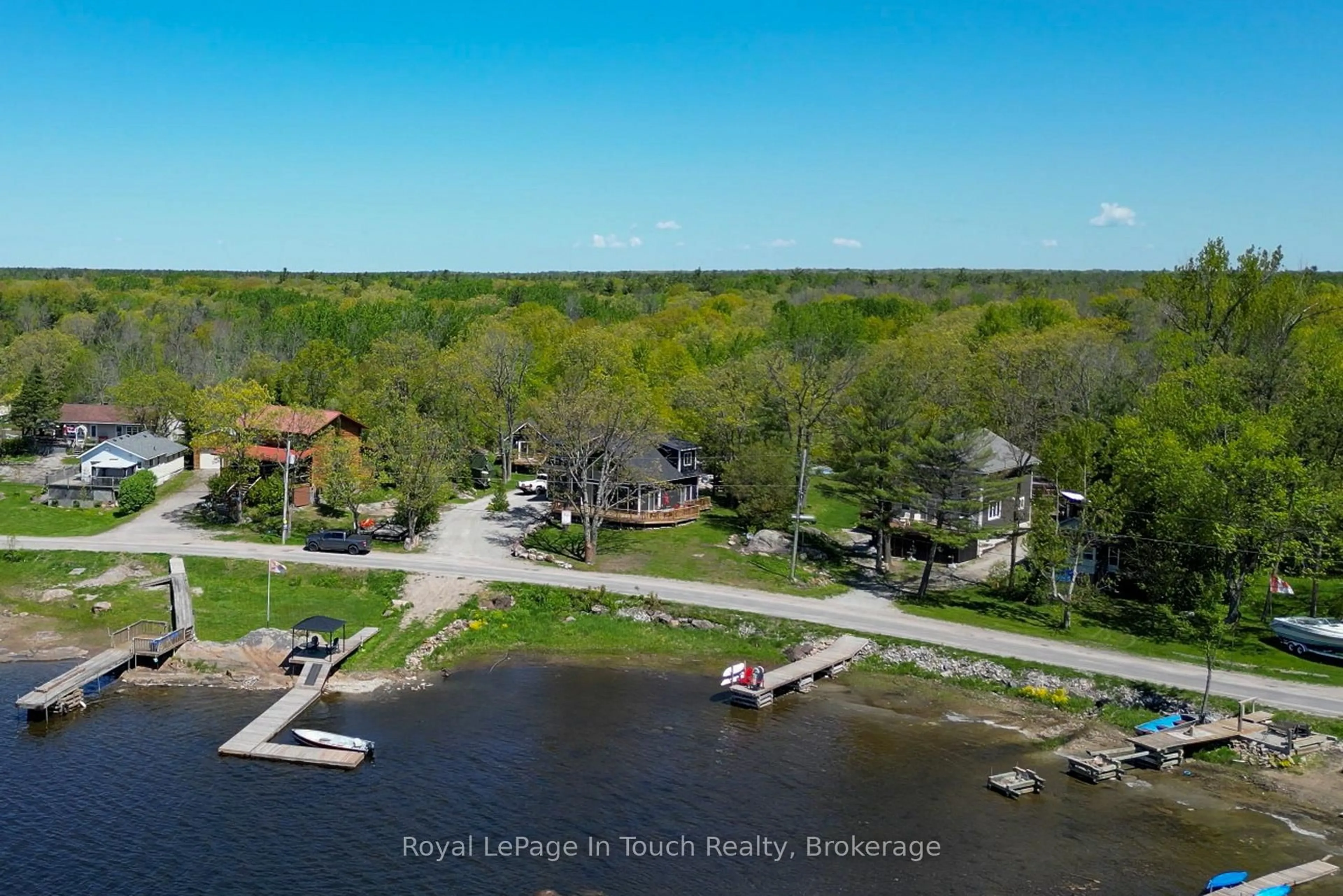 A pic from outside/outdoor area/front of a property/back of a property/a pic from drone, water/lake/river/ocean view for 26 Macey Bay Rd, Georgian Bay Ontario L0K 1S0