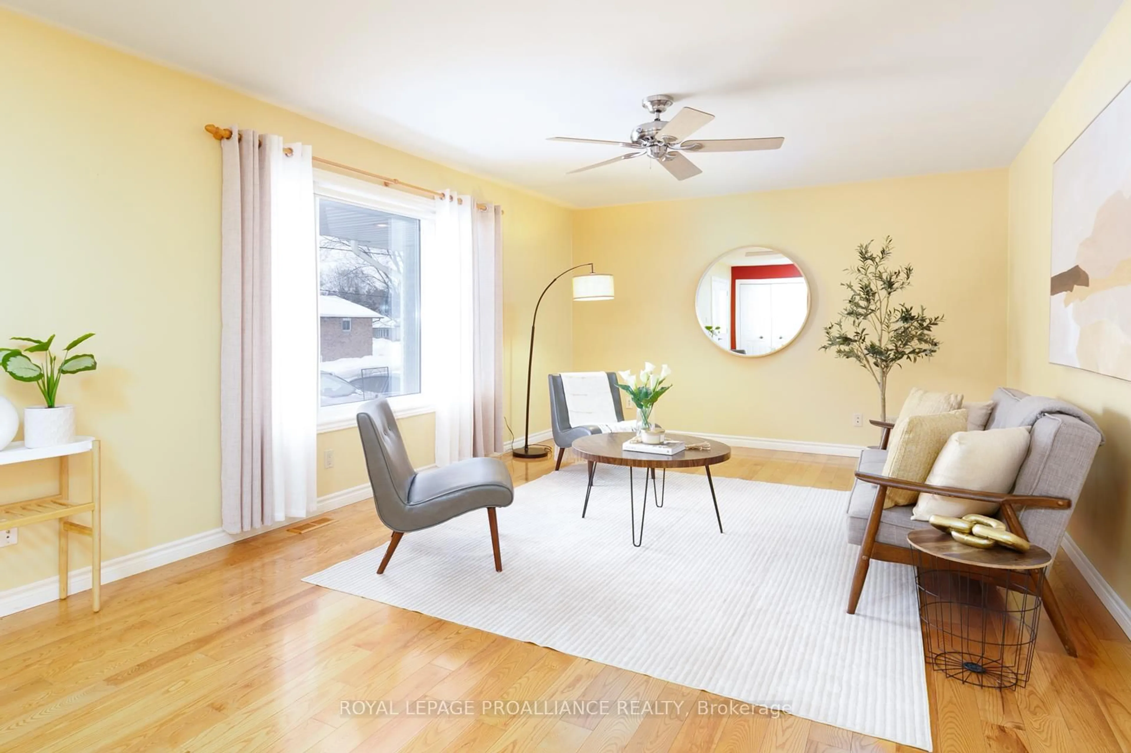 Living room with furniture, wood/laminate floor for 12 Butler St, Brighton Ontario K0K 1H0