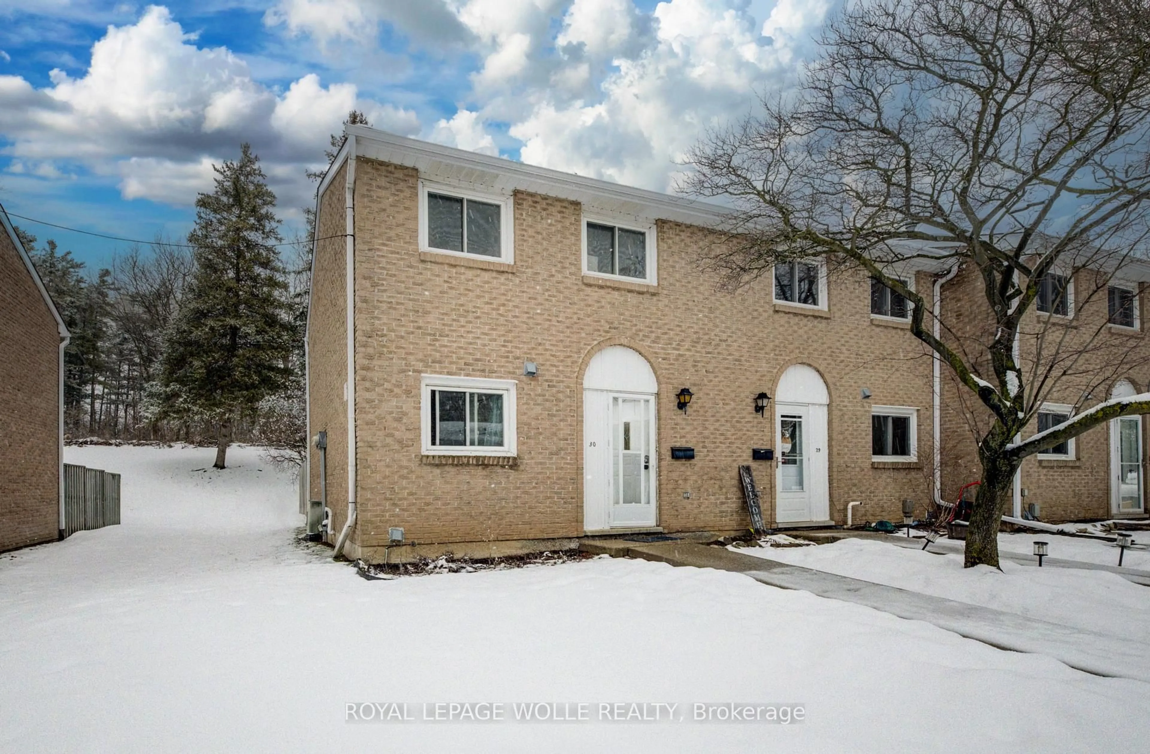 A pic from outside/outdoor area/front of a property/back of a property/a pic from drone, street for 206 Green Valley Dr #30, Kitchener Ontario N2P 1G9