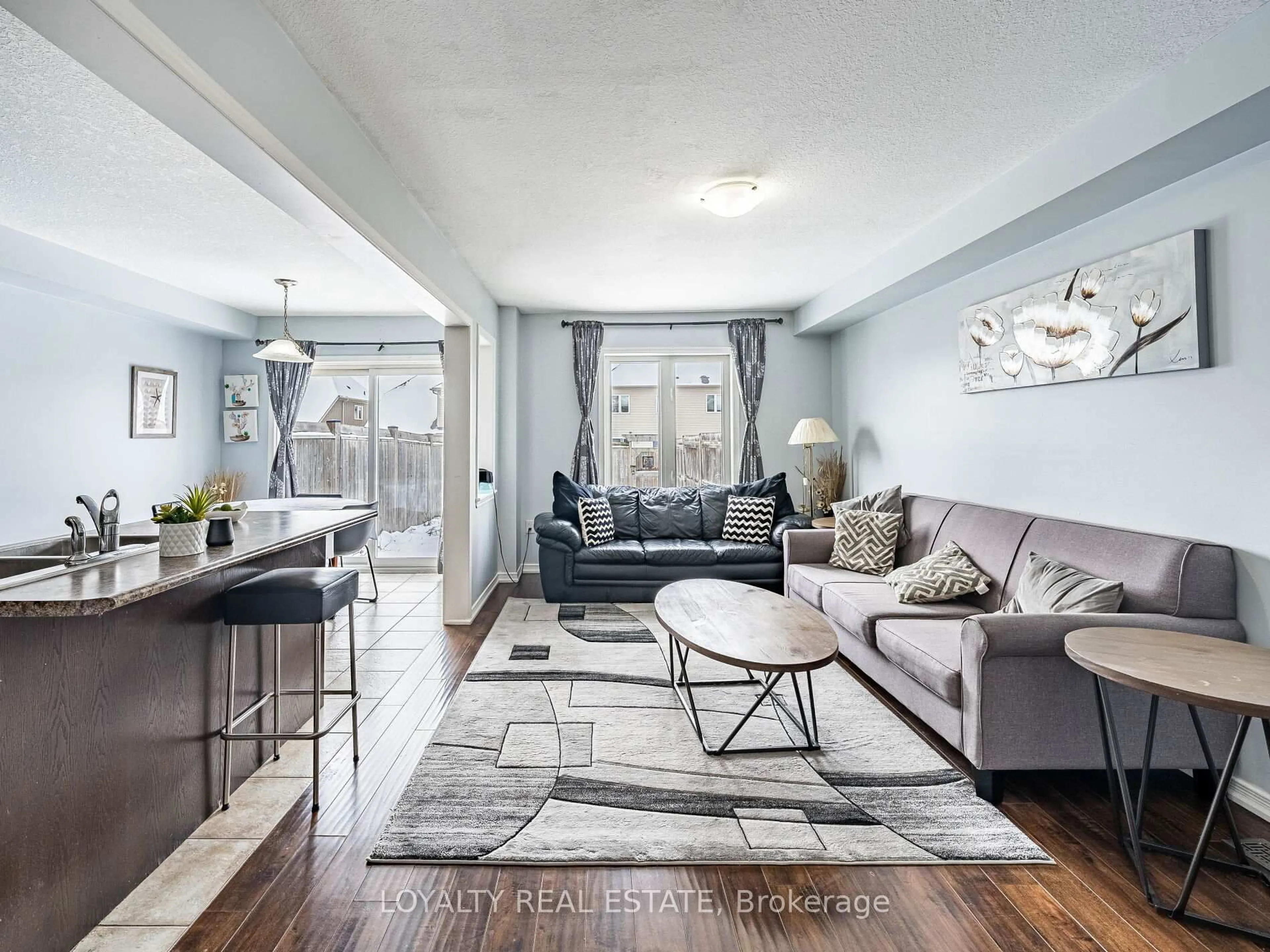 Living room with furniture, unknown for 64 English Lane, Brantford Ontario N3T 0G9