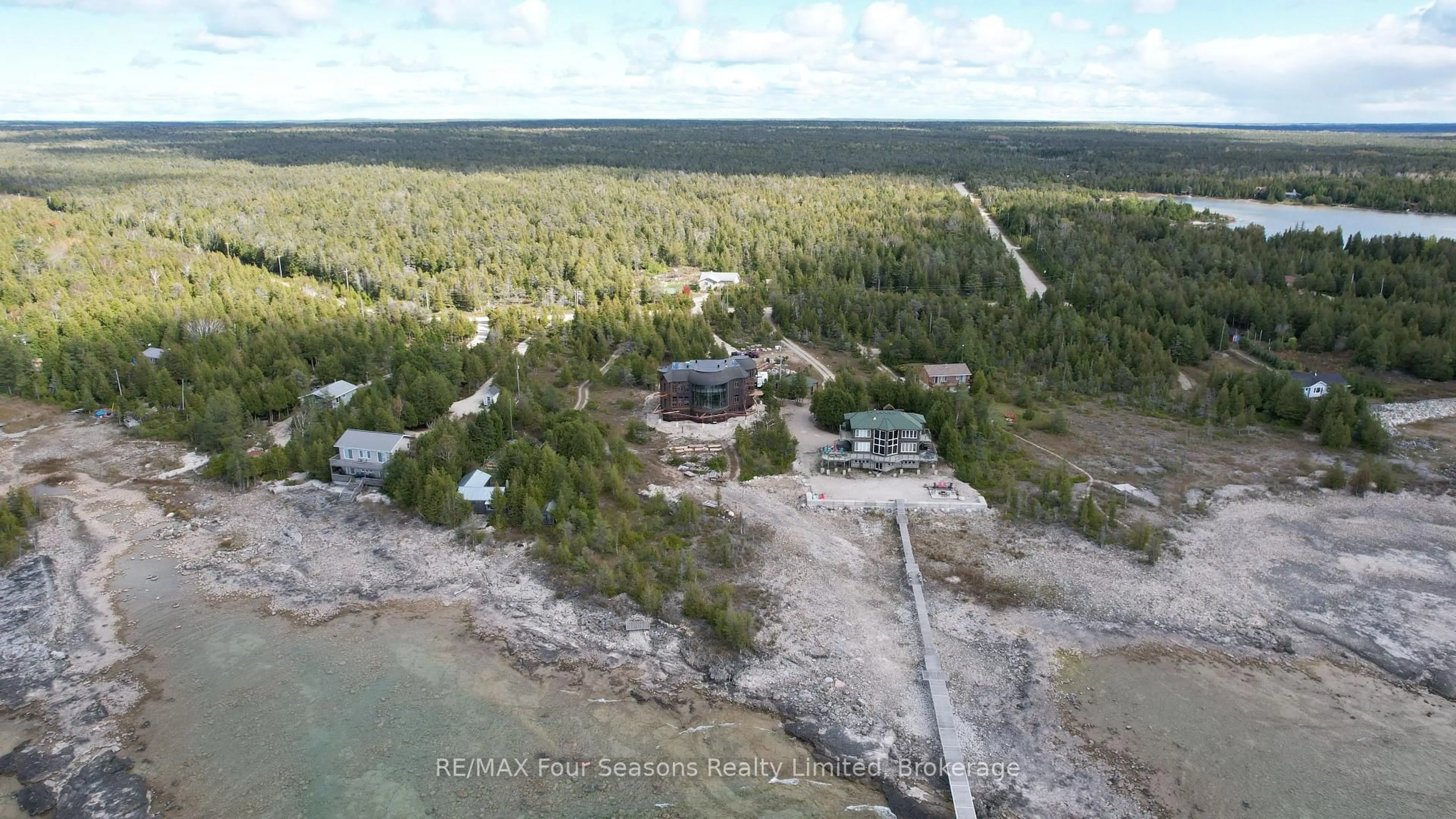 A pic from outside/outdoor area/front of a property/back of a property/a pic from drone, water/lake/river/ocean view for 794 Dorcas Bay Rd, Northern Bruce Peninsula Ontario N0H 2R0
