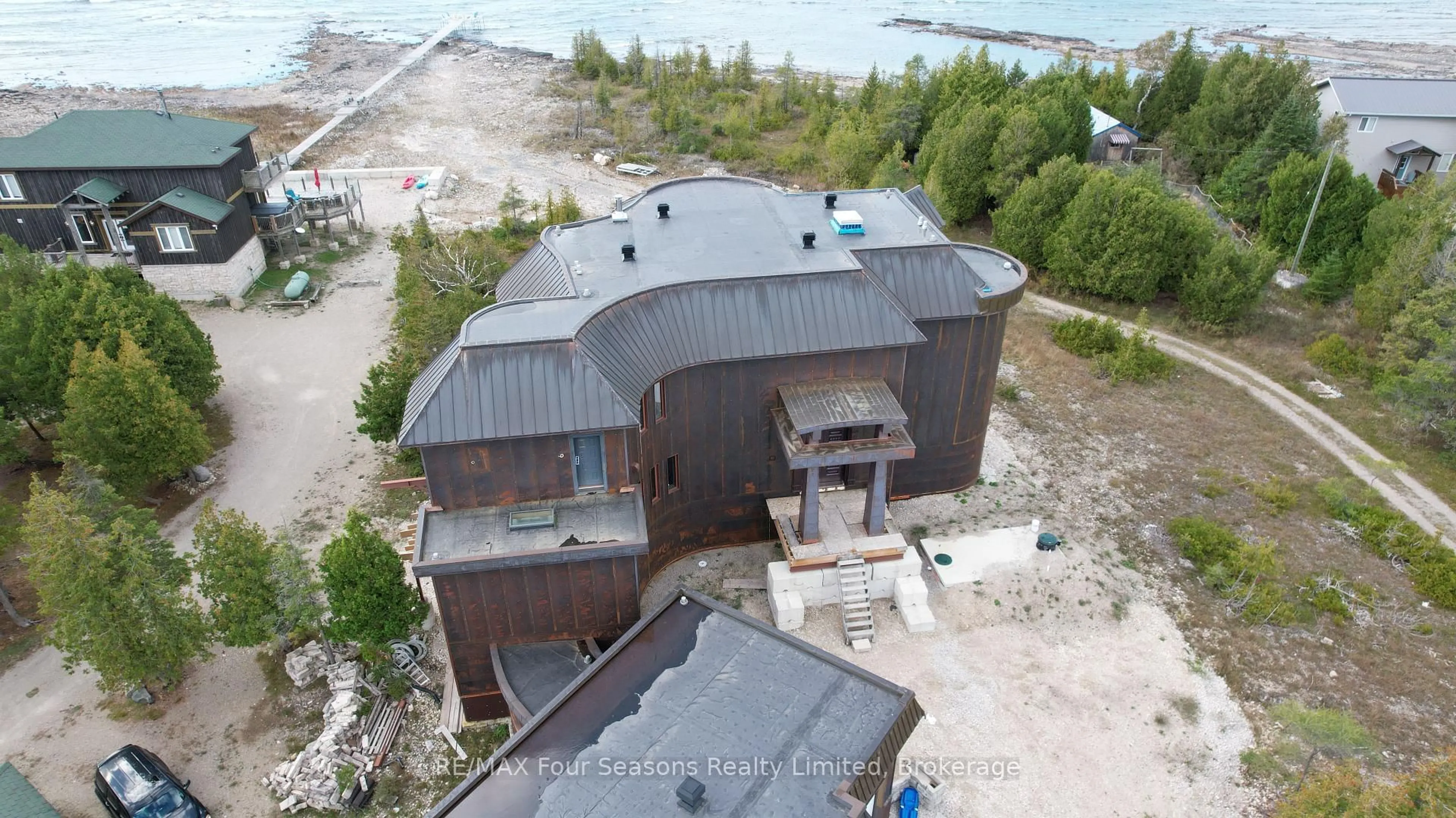 A pic from outside/outdoor area/front of a property/back of a property/a pic from drone, building for 794 Dorcas Bay Rd, Northern Bruce Peninsula Ontario N0H 2R0