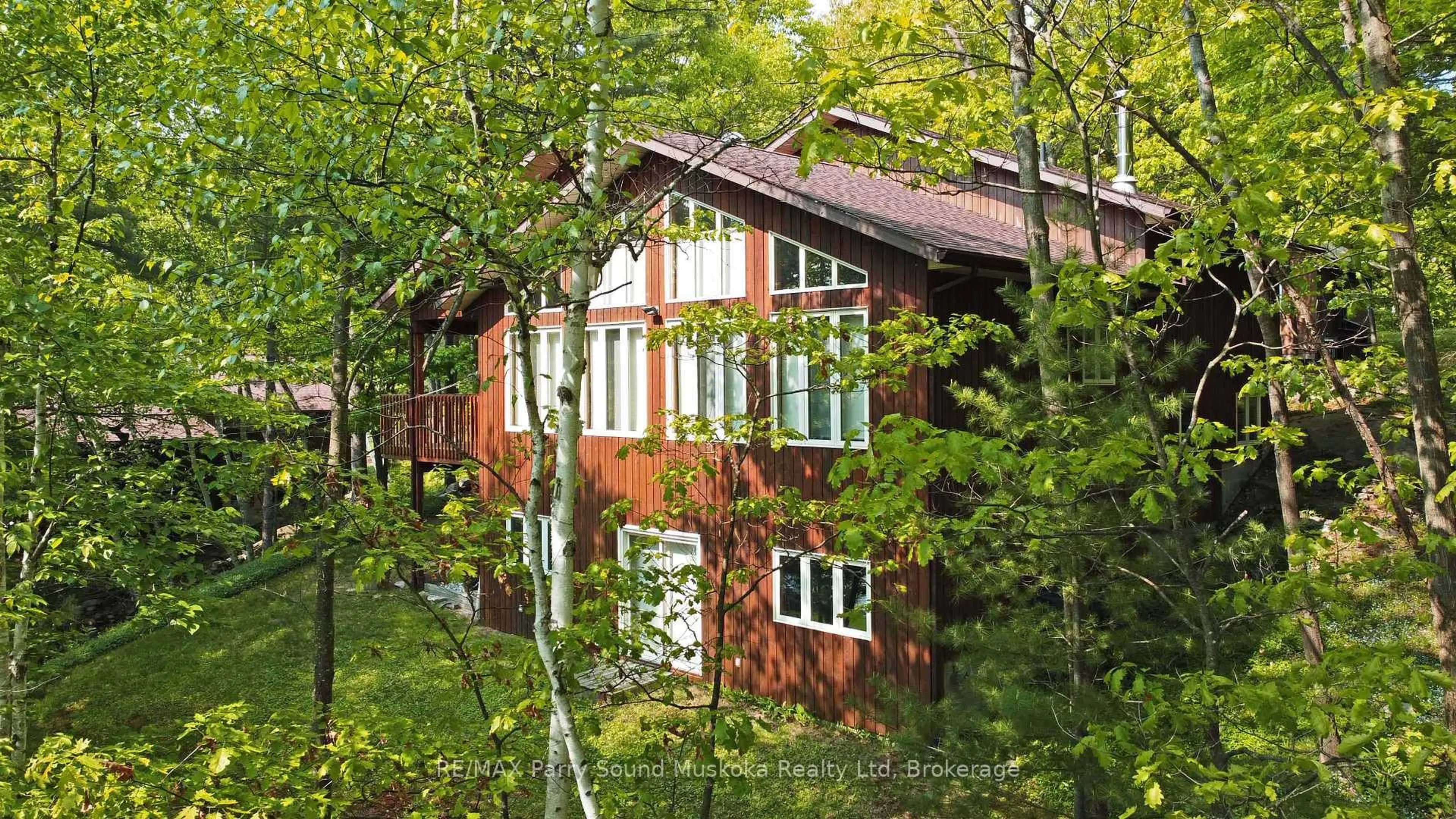 Home with brick exterior material, unknown for 38 Shebeshekong Estates Rd, Carling Ontario P0G 1G0