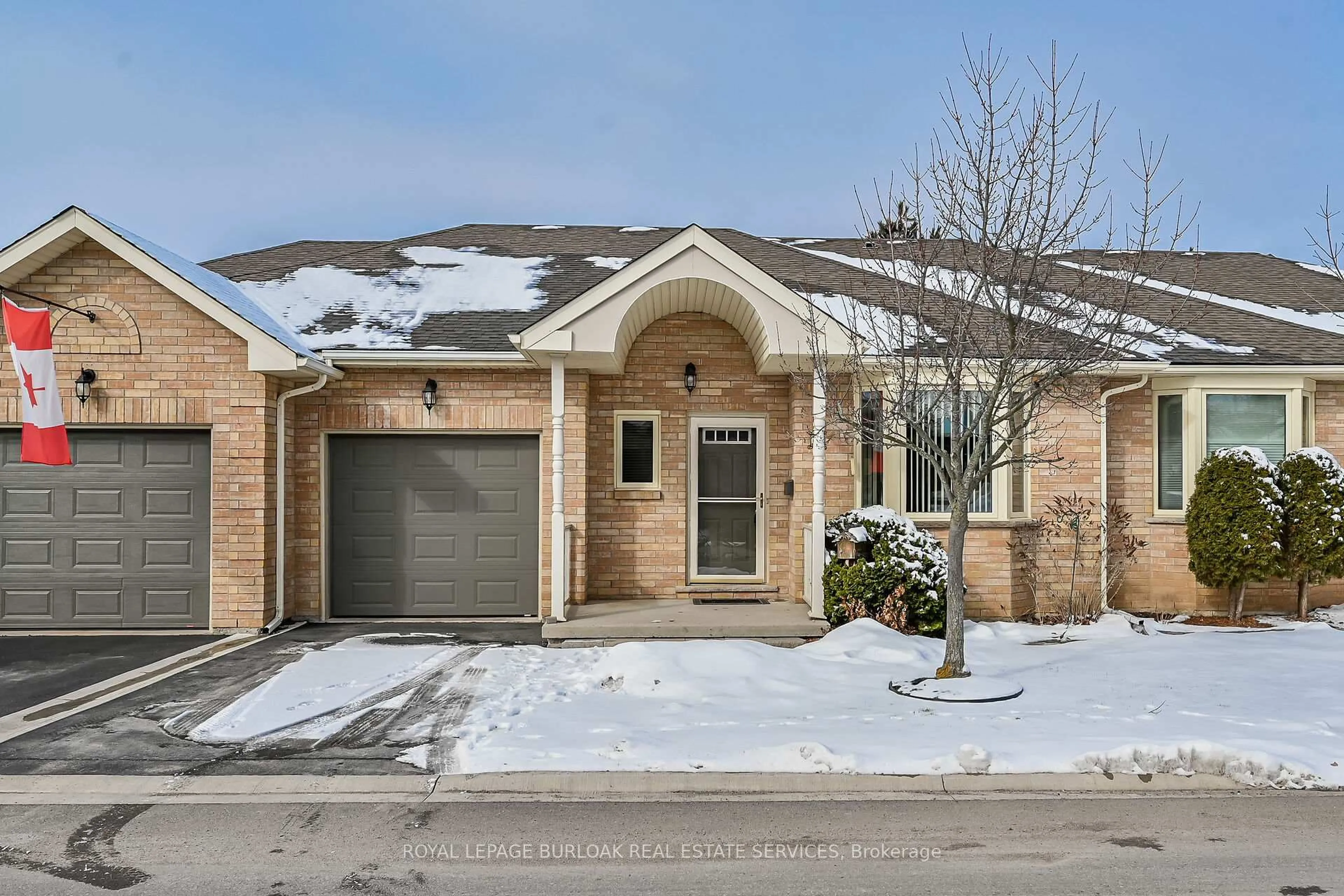 Home with brick exterior material, street for 20 Twentyplace Blvd, Hamilton Ontario L0R 1W0
