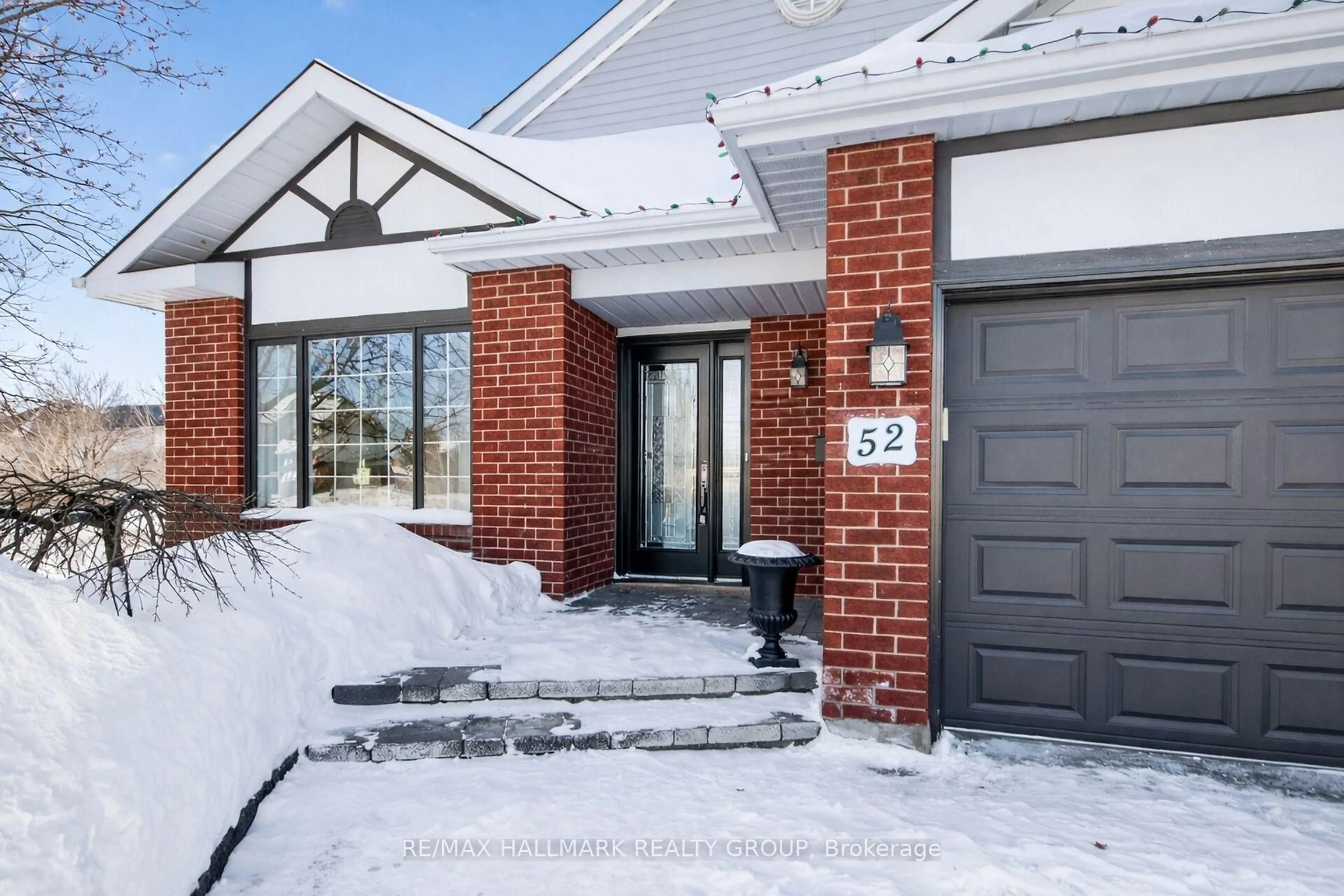 Home with brick exterior material, street for 52 Bramblewood Cres, Kanata Ontario K1T 3G2