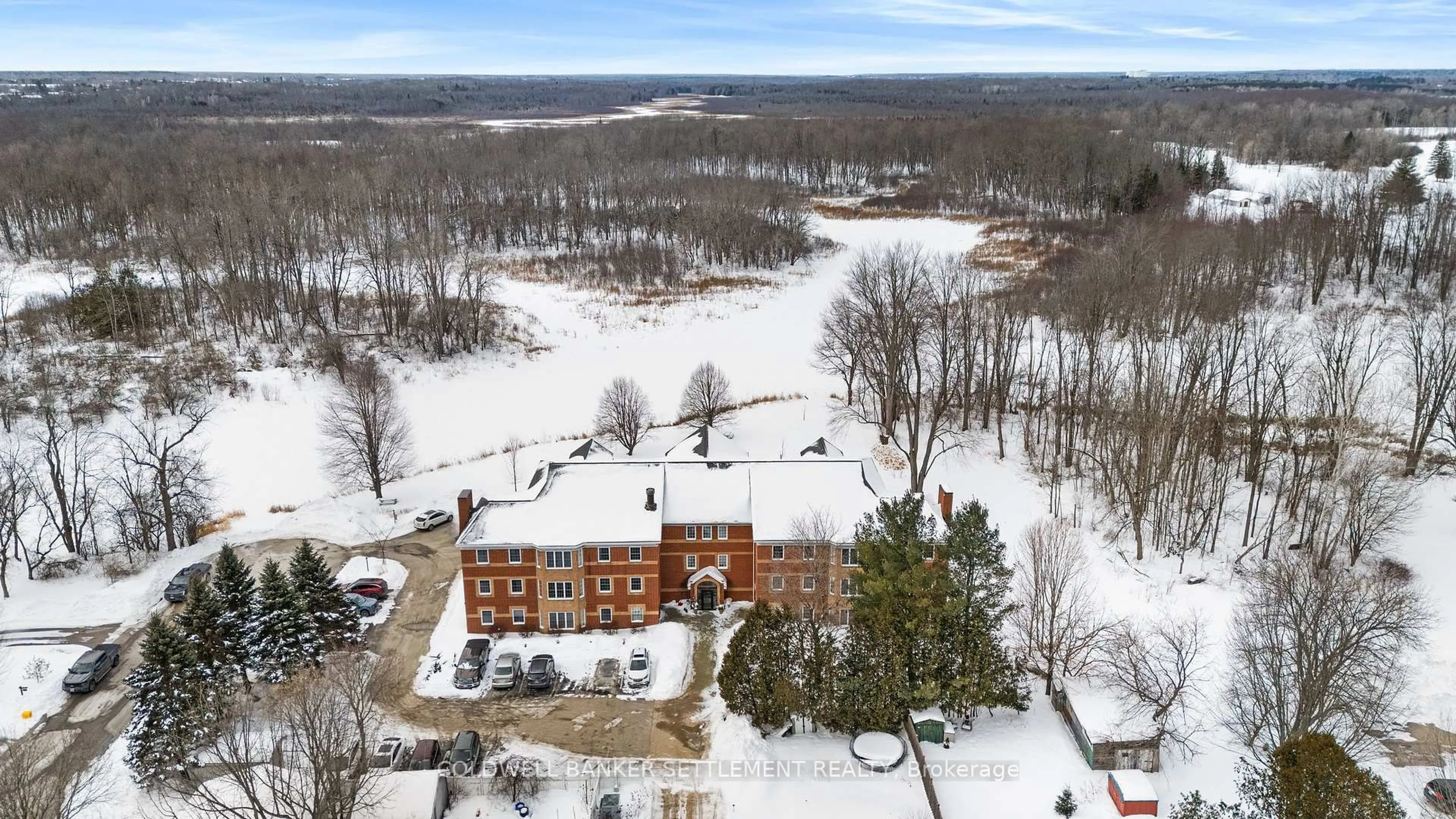 A pic from outside/outdoor area/front of a property/back of a property/a pic from drone, water/lake/river/ocean view for 19 John St #201, Perth Ontario K7H 1T8