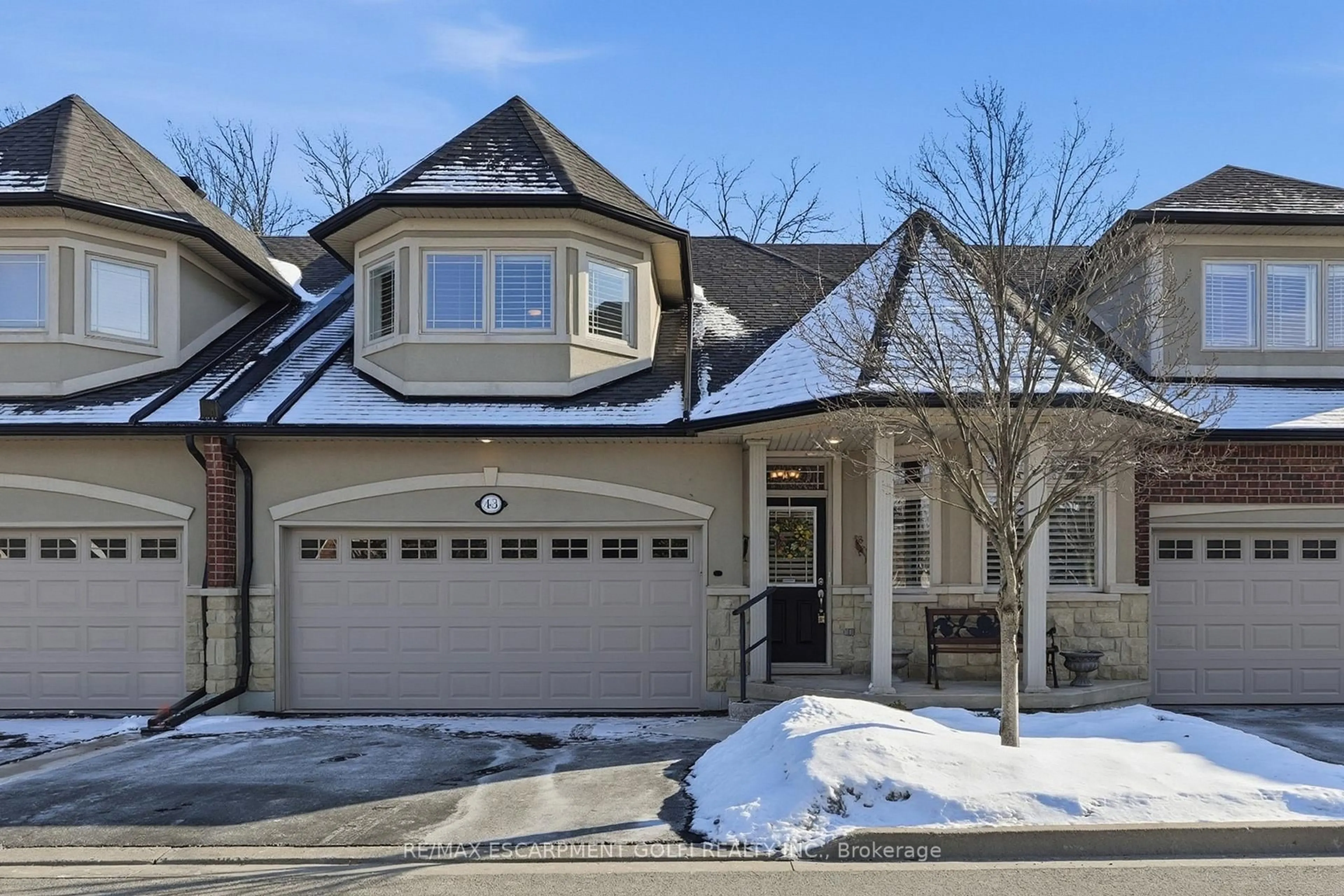 Home with brick exterior material, street for 43 Landscapes Tr, Hamilton Ontario L9K 0A1