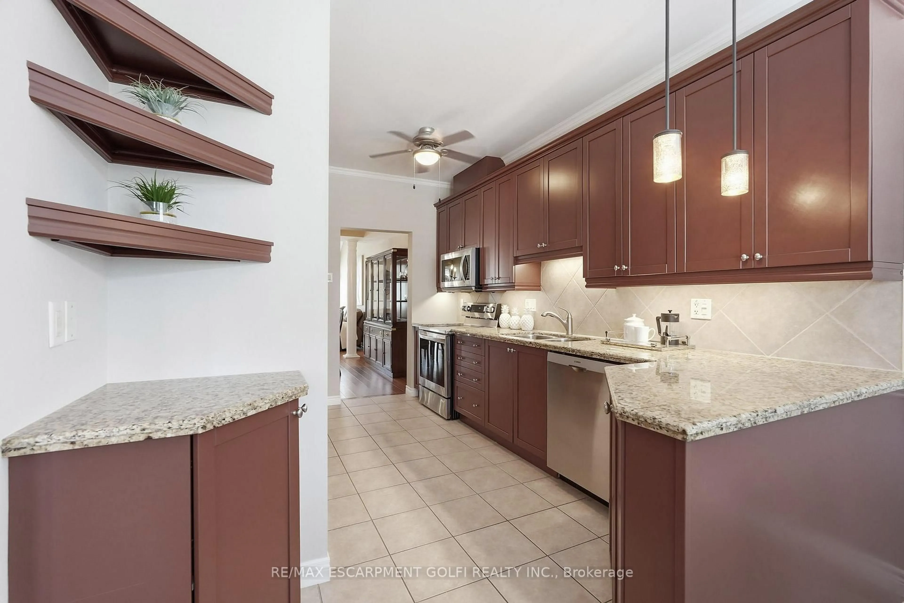 Open concept kitchen, ceramic/tile floor for 43 Landscapes Tr, Hamilton Ontario L9K 0A1