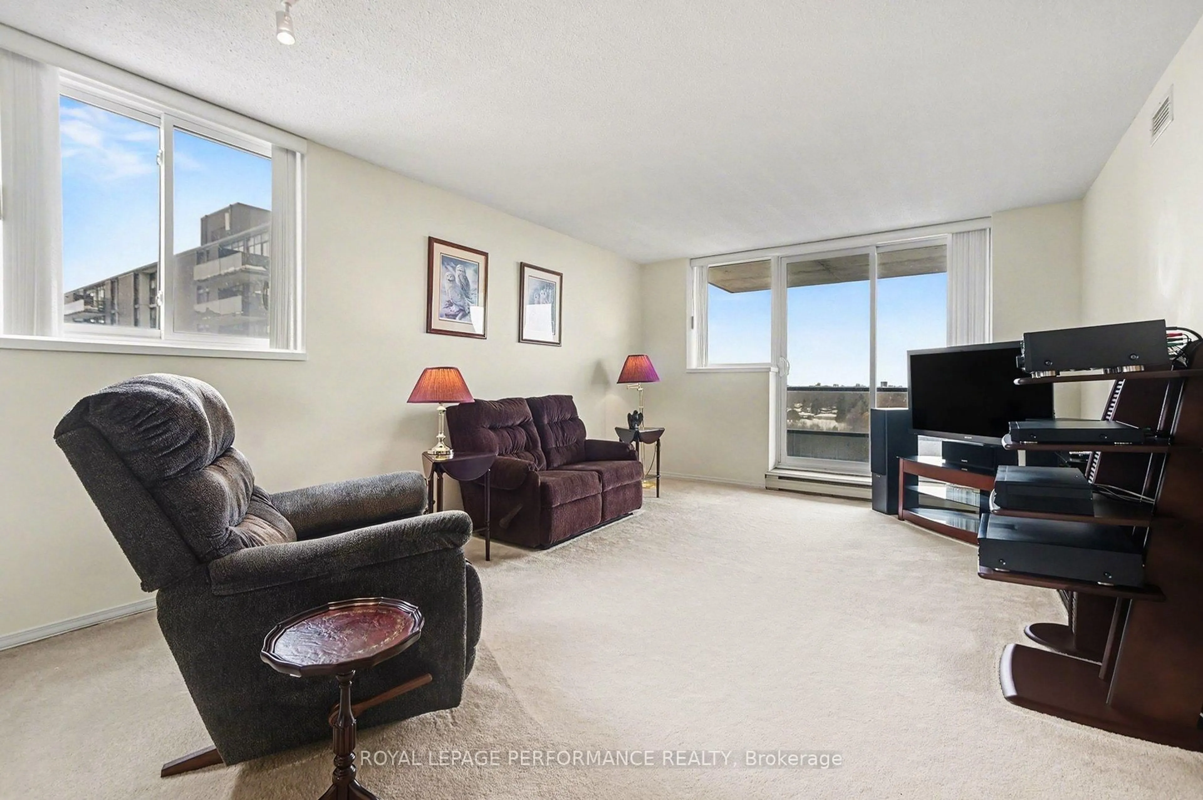 Living room with furniture, unknown for 1705 Playfair Dr #1207, Ottawa Ontario K1H 8P6