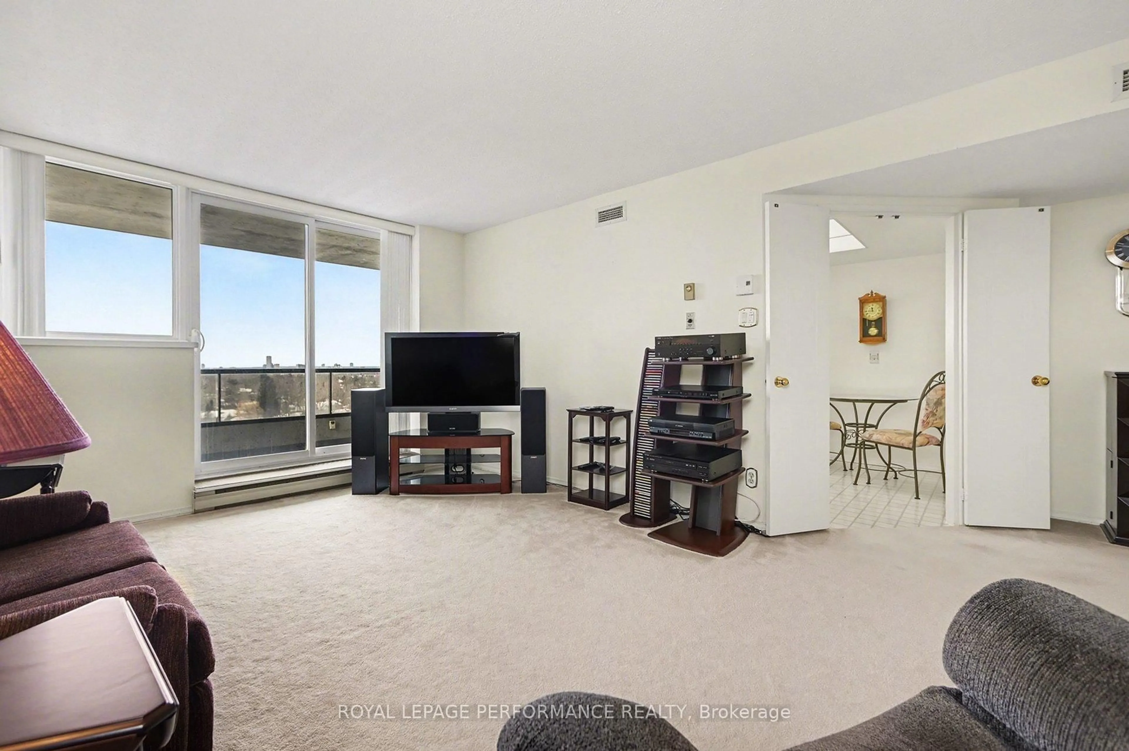 Living room with furniture, unknown for 1705 Playfair Dr #1207, Ottawa Ontario K1H 8P6