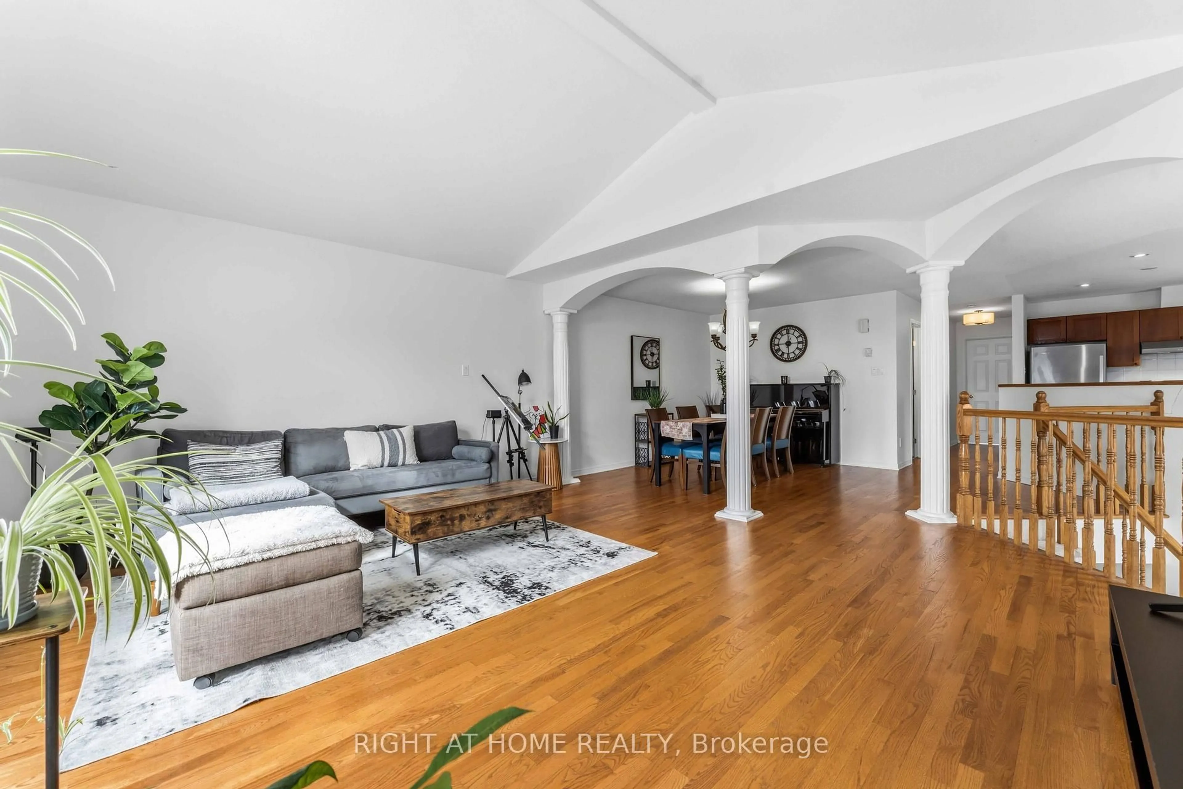Living room with furniture, wood/laminate floor for 4 Castle Glen Cres, Ottawa Ontario K2L 4H1