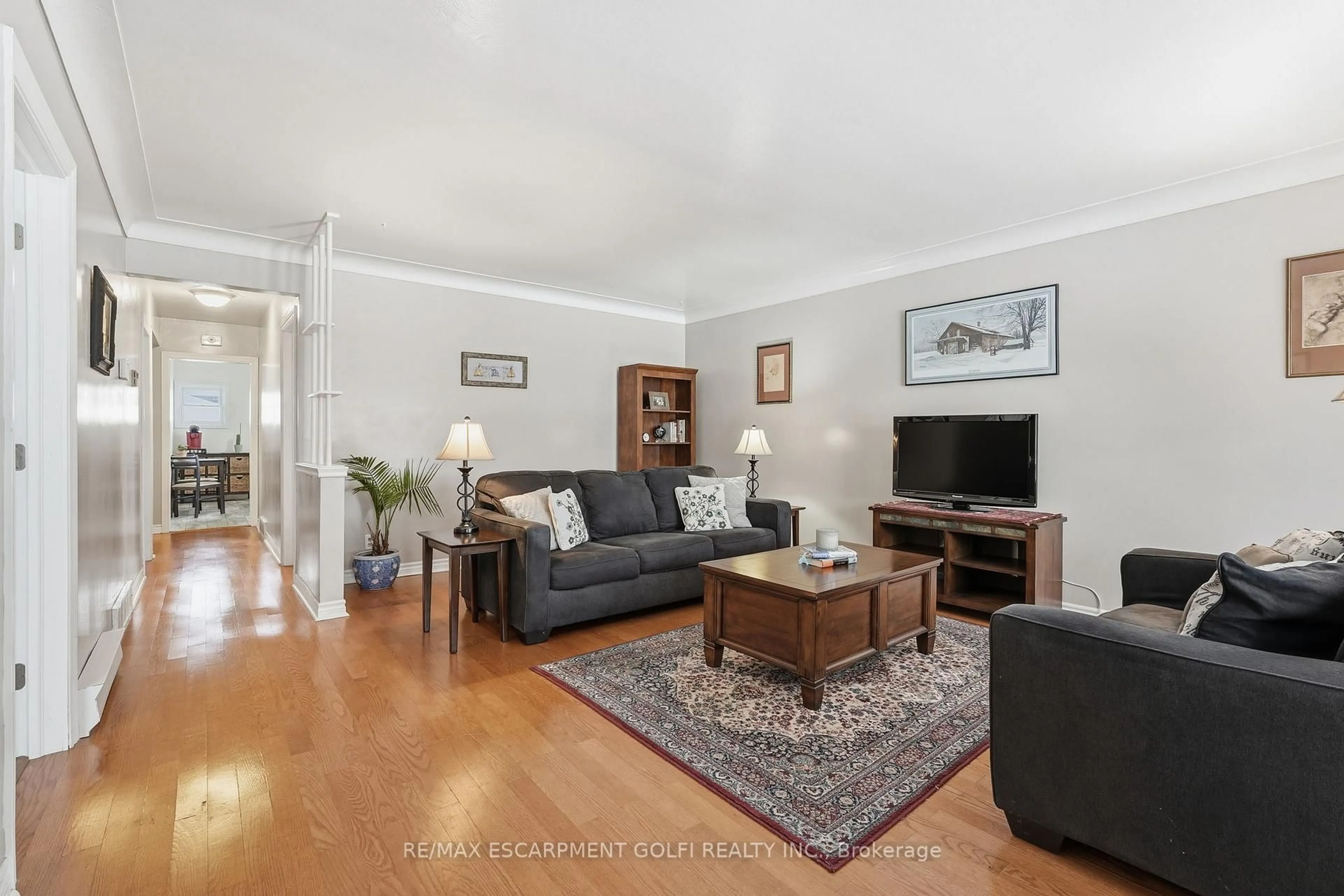 Living room with furniture, unknown for 319 Vansitmart Ave, Hamilton Ontario L8H 3B5