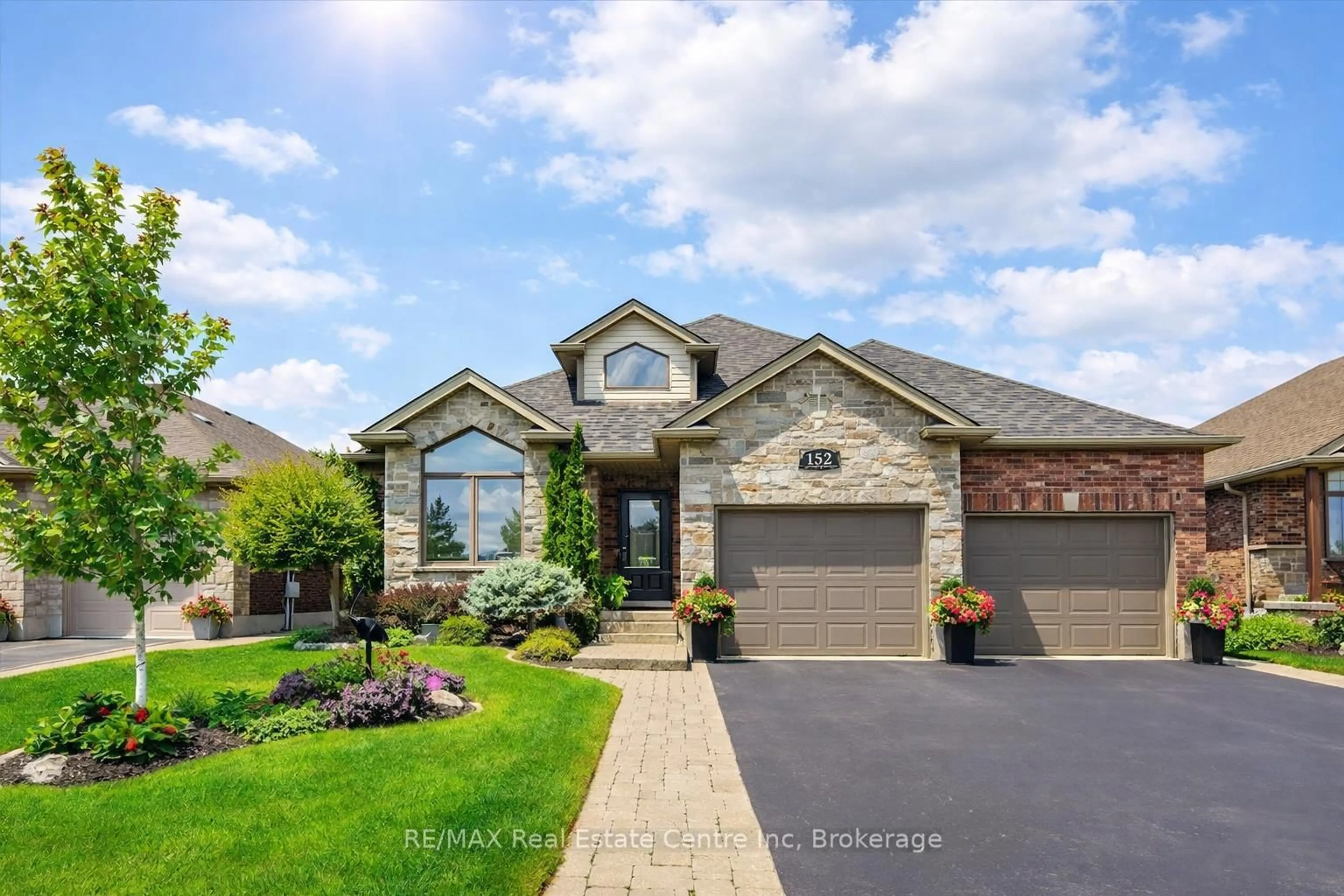 Home with brick exterior material, street for 152 SPENCER Dr, Centre Wellington Ontario N0B 1S0