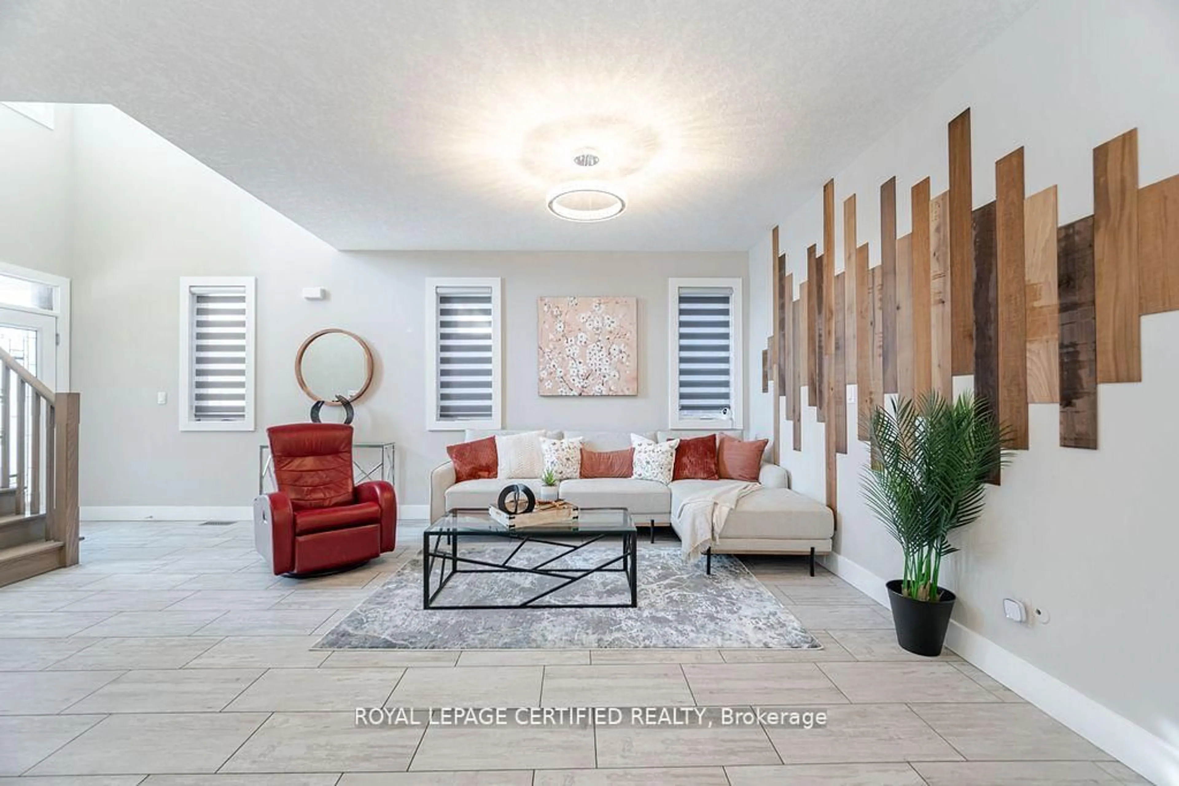 Living room with furniture, ceramic/tile floor for 204 Forest Creek Dr, Kitchener Ontario N2P 2R3