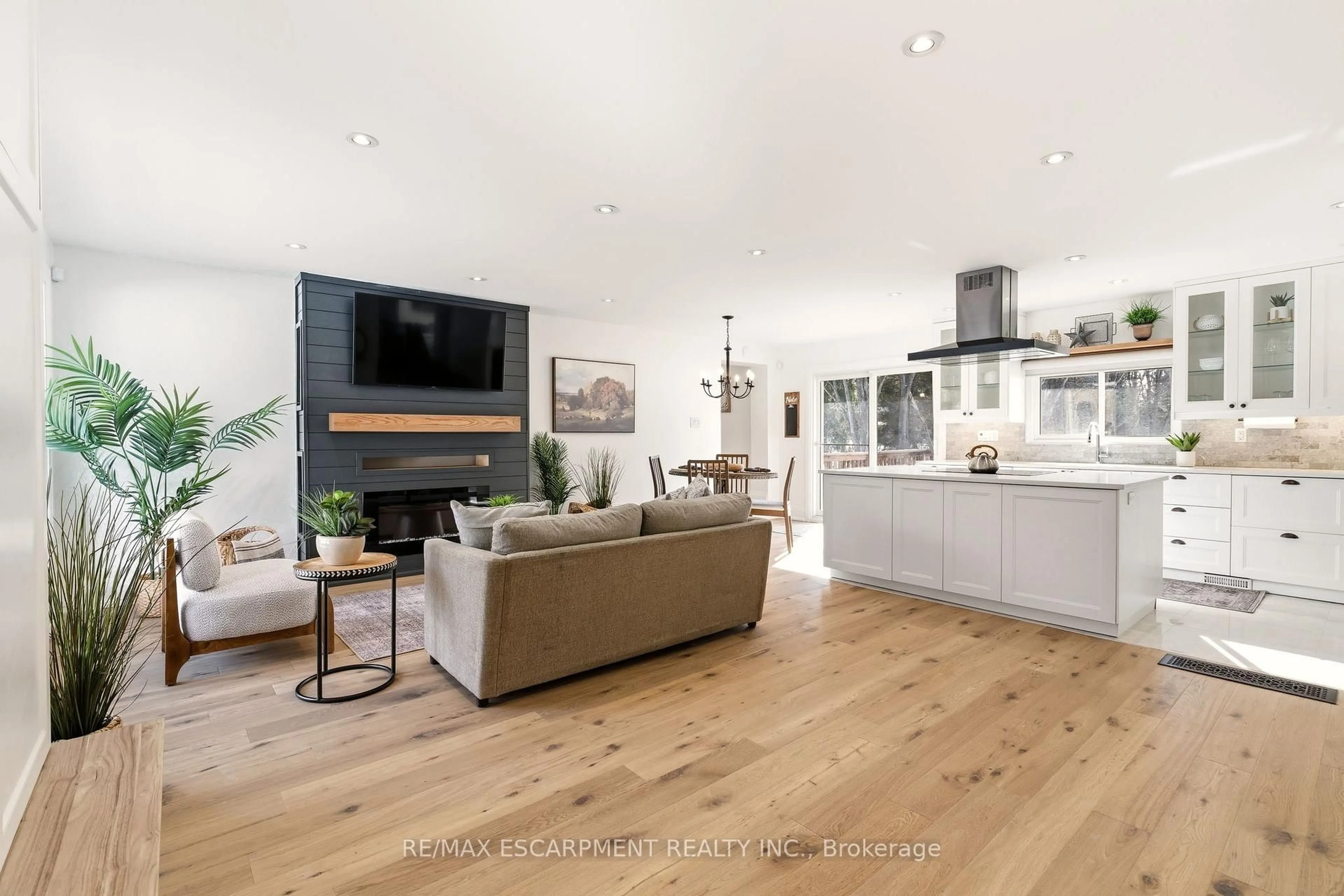 Open concept kitchen, wood/laminate floor for 22 Rosebough St, Hamilton Ontario L9H 5C5