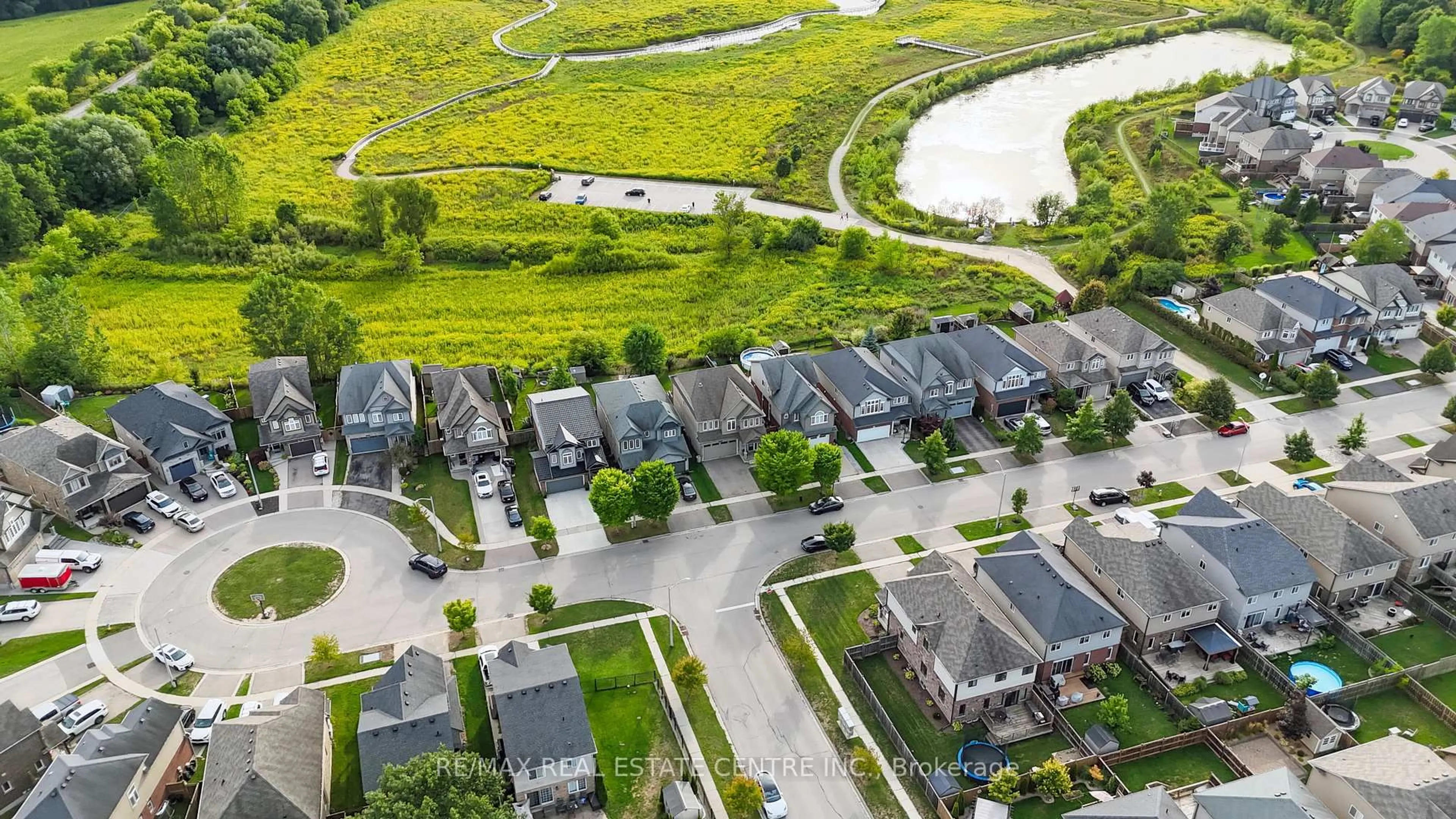 A pic from outside/outdoor area/front of a property/back of a property/a pic from drone, street for 56 Smith's Creek Dr, Wilmot Ontario N3A 0B3