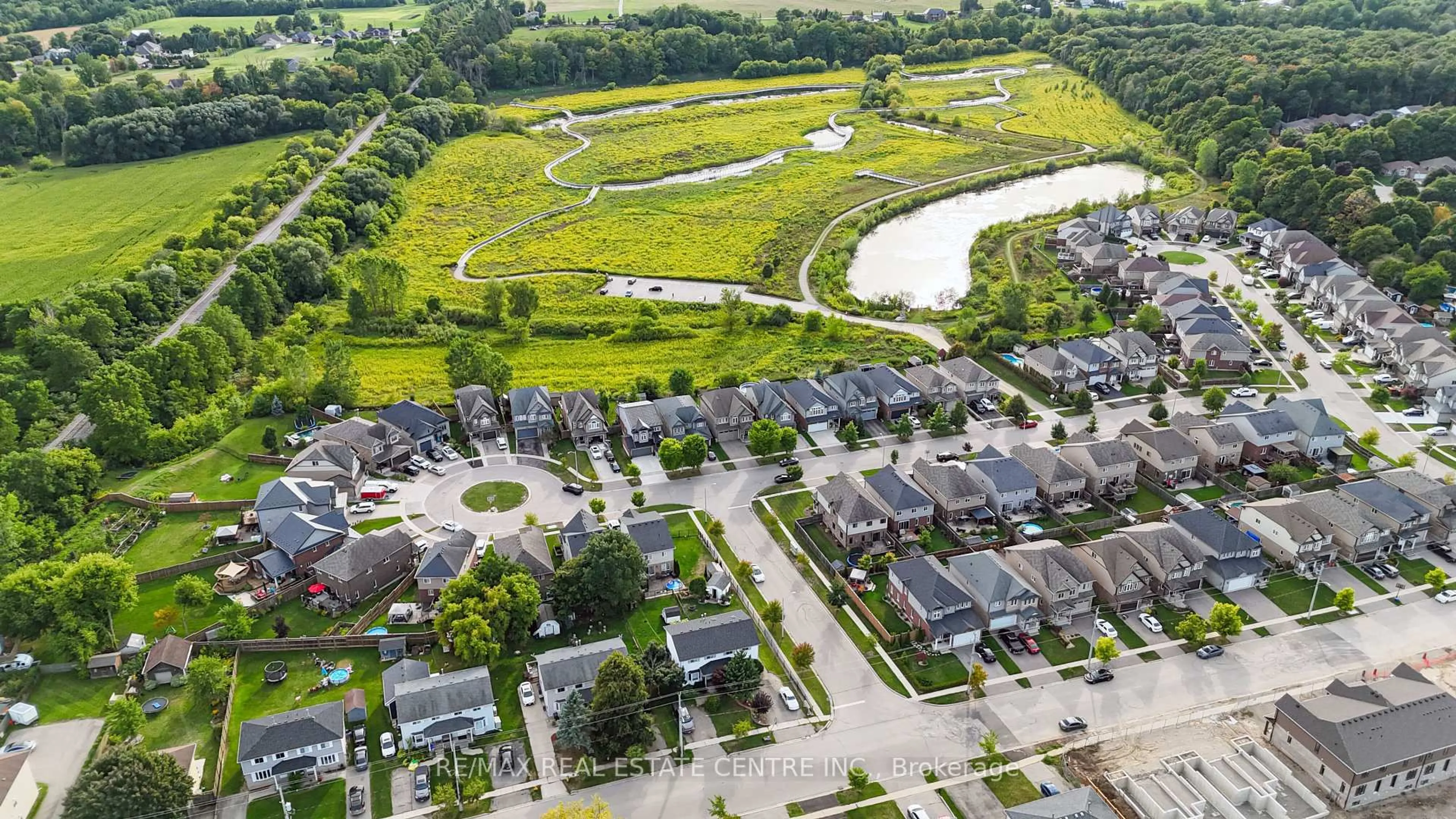 A pic from outside/outdoor area/front of a property/back of a property/a pic from drone, street for 56 Smith's Creek Dr, Wilmot Ontario N3A 0B3