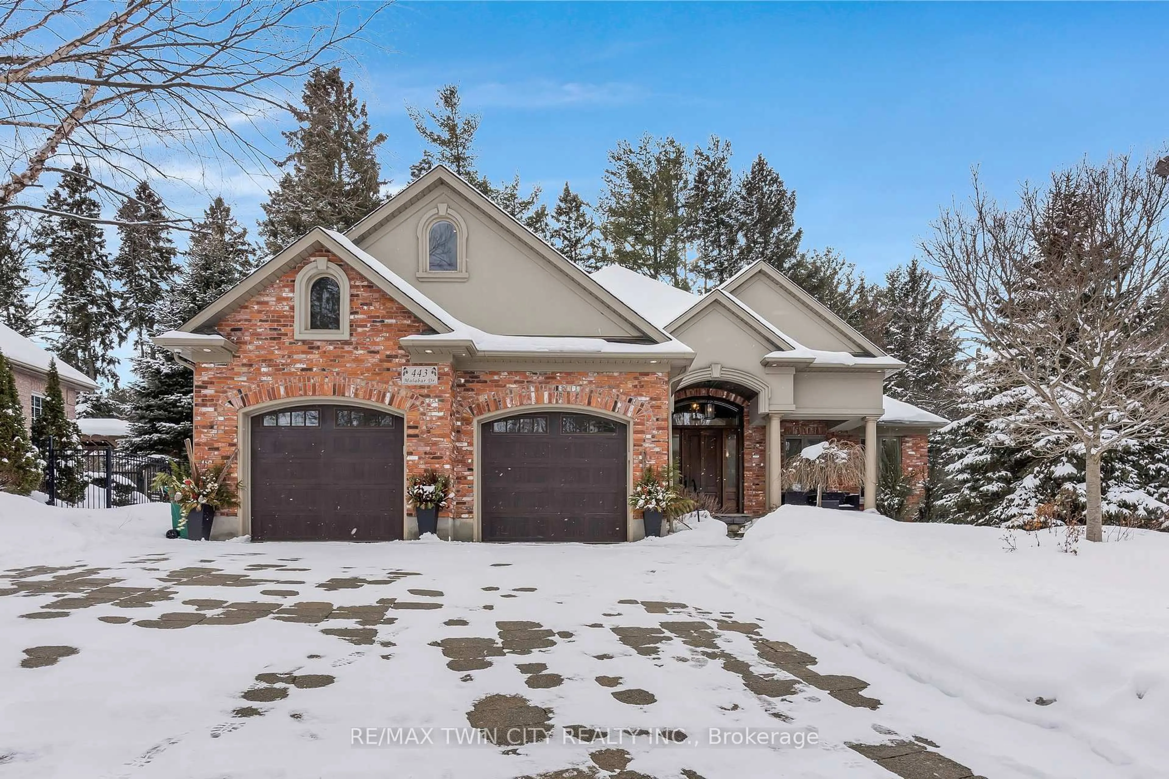 Home with brick exterior material, street for 443 Malabar Dr, Waterloo Ontario N2K 2P7