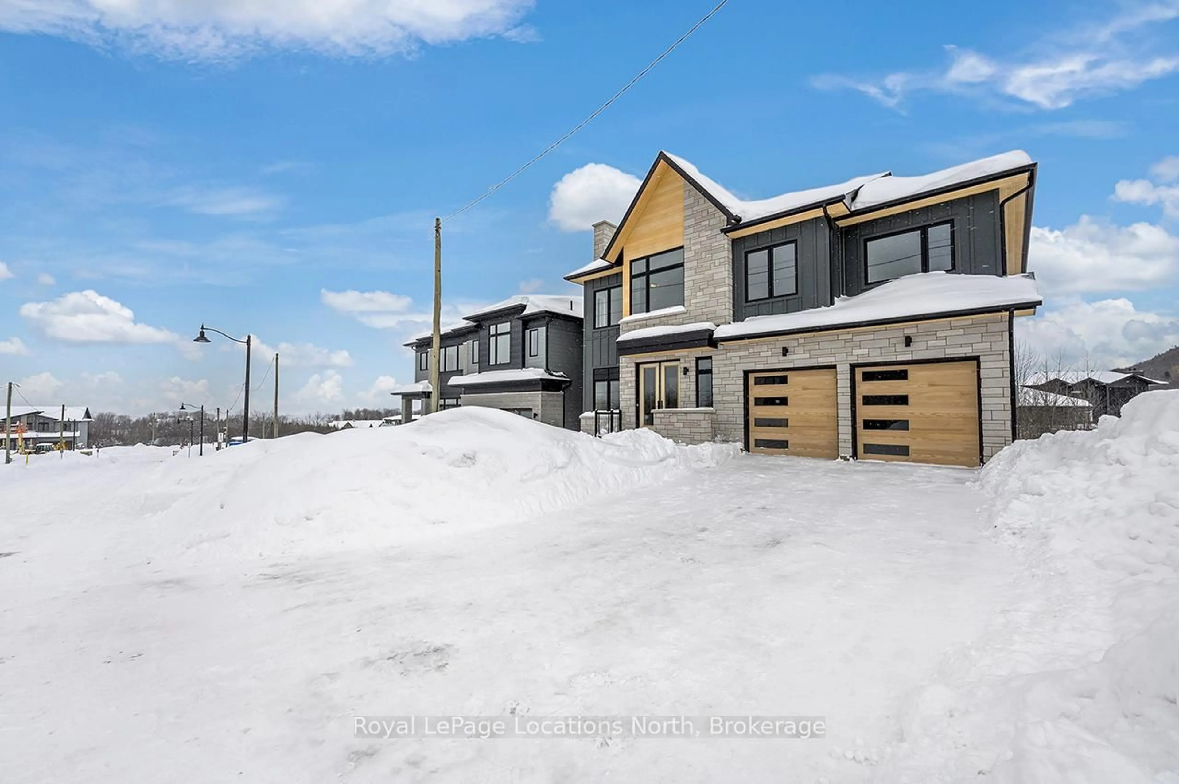 A pic from outside/outdoor area/front of a property/back of a property/a pic from drone, street for 113 Clement Lane, Blue Mountains Ontario N0H 1J0