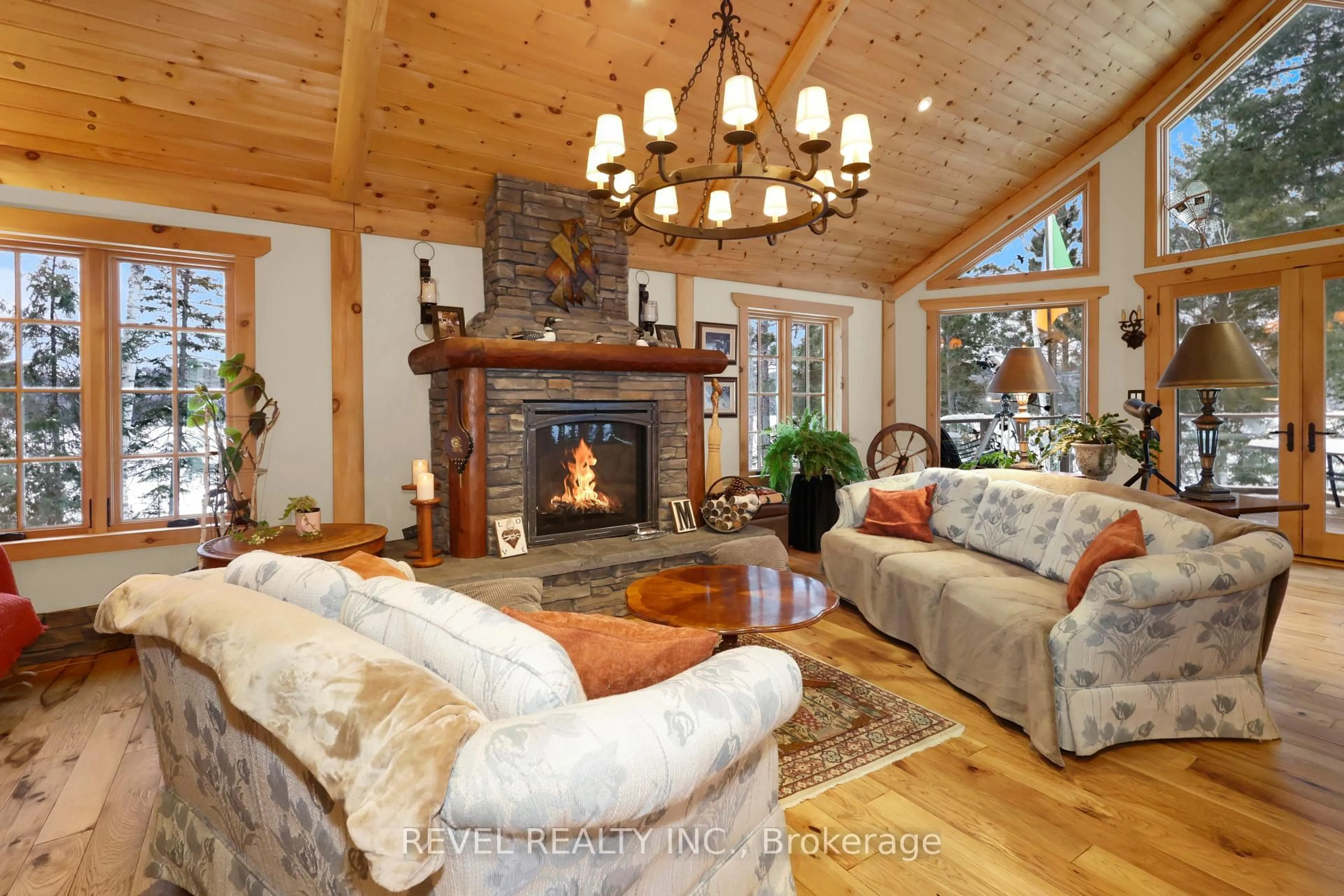 Living room with furniture, wood/laminate floor for 28 Beaver Pond Rd, Elliot Lake Ontario P5A 2J7