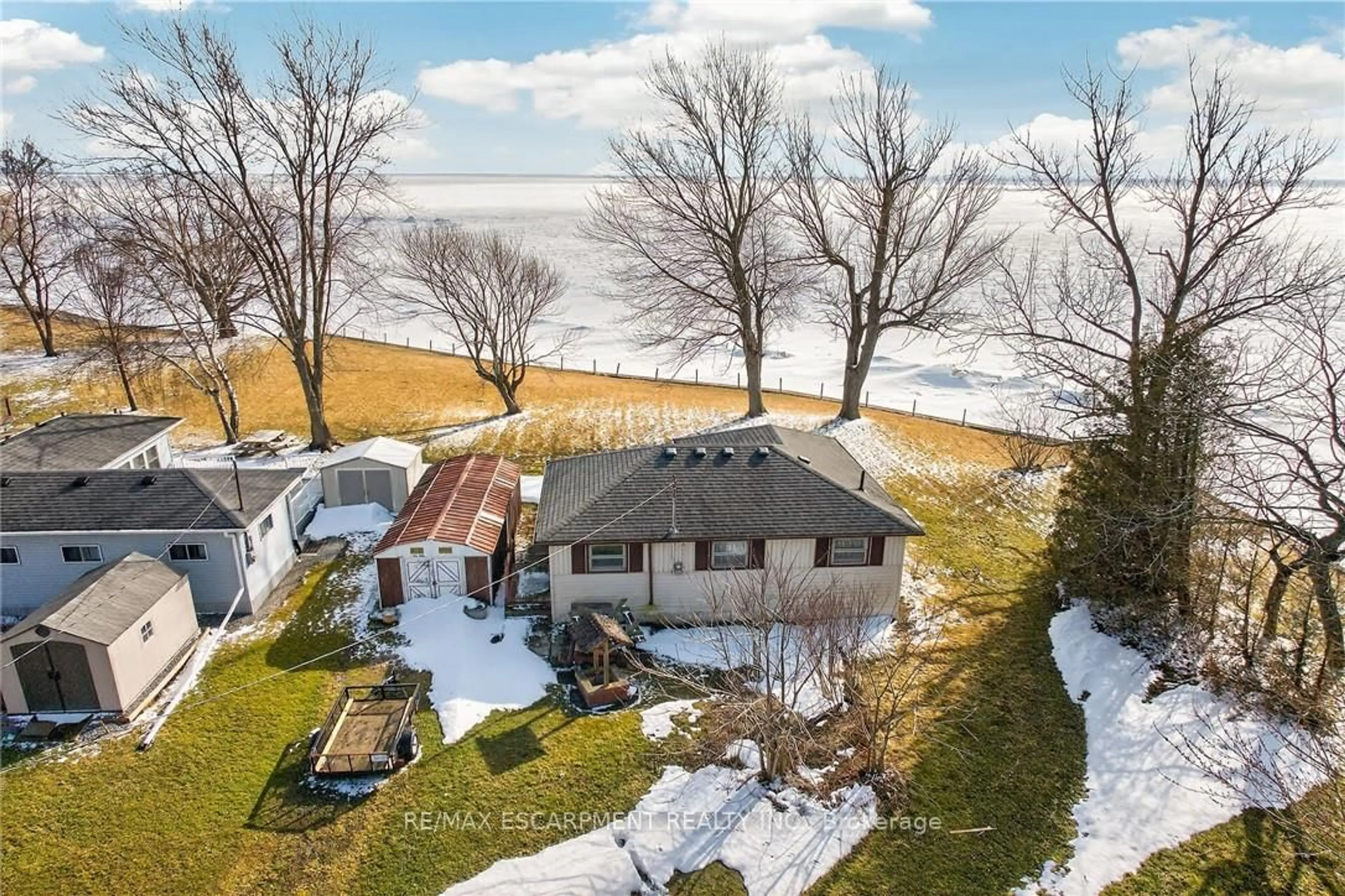 A pic from outside/outdoor area/front of a property/back of a property/a pic from drone, water/lake/river/ocean view for 3076 Lakeshore Rd, Haldimand Ontario N1A 2W8