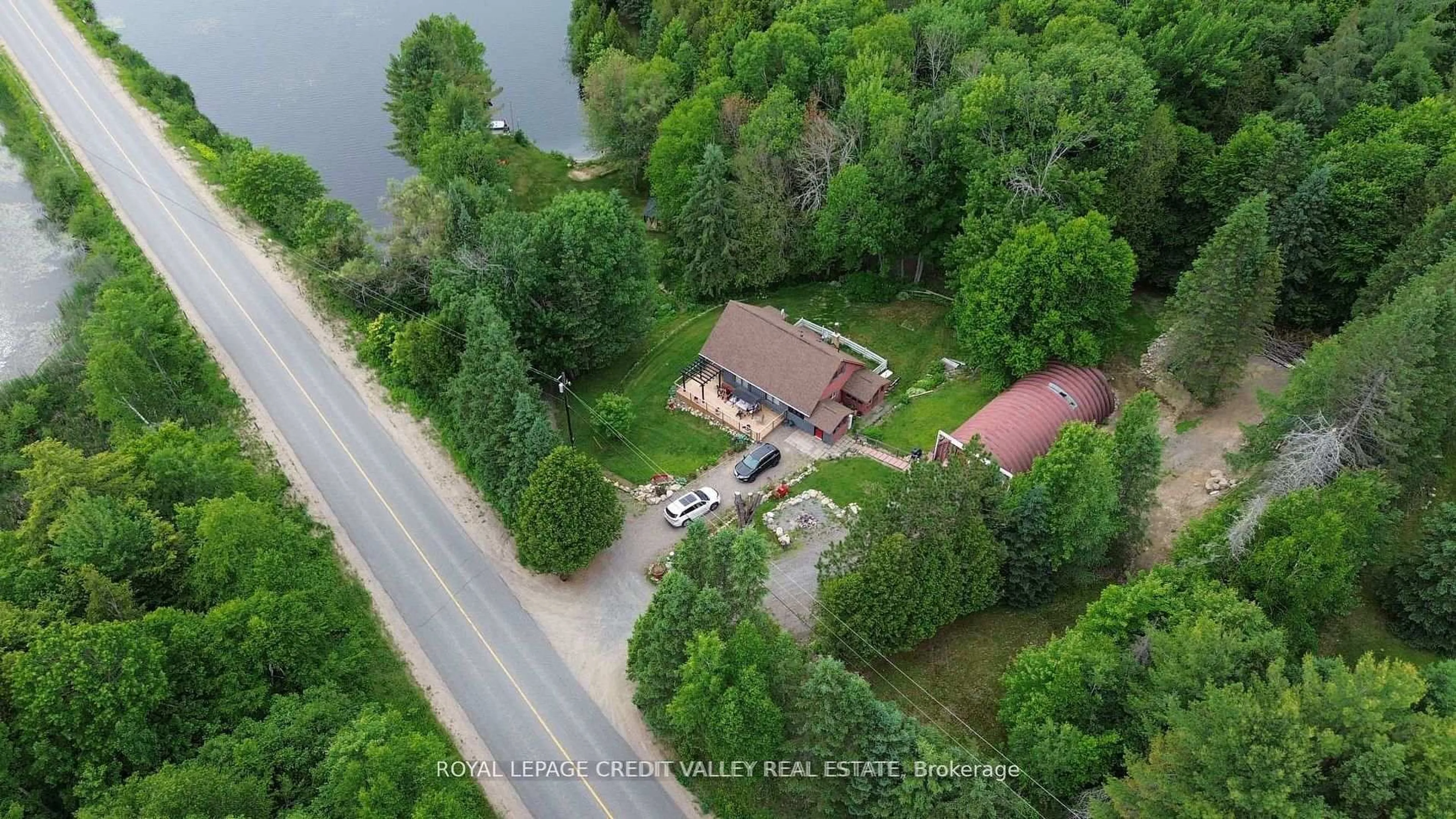 A pic from outside/outdoor area/front of a property/back of a property/a pic from drone, water/lake/river/ocean view for 992 South Baptiste Lake Rd, Bancroft Ontario K0L 1C0