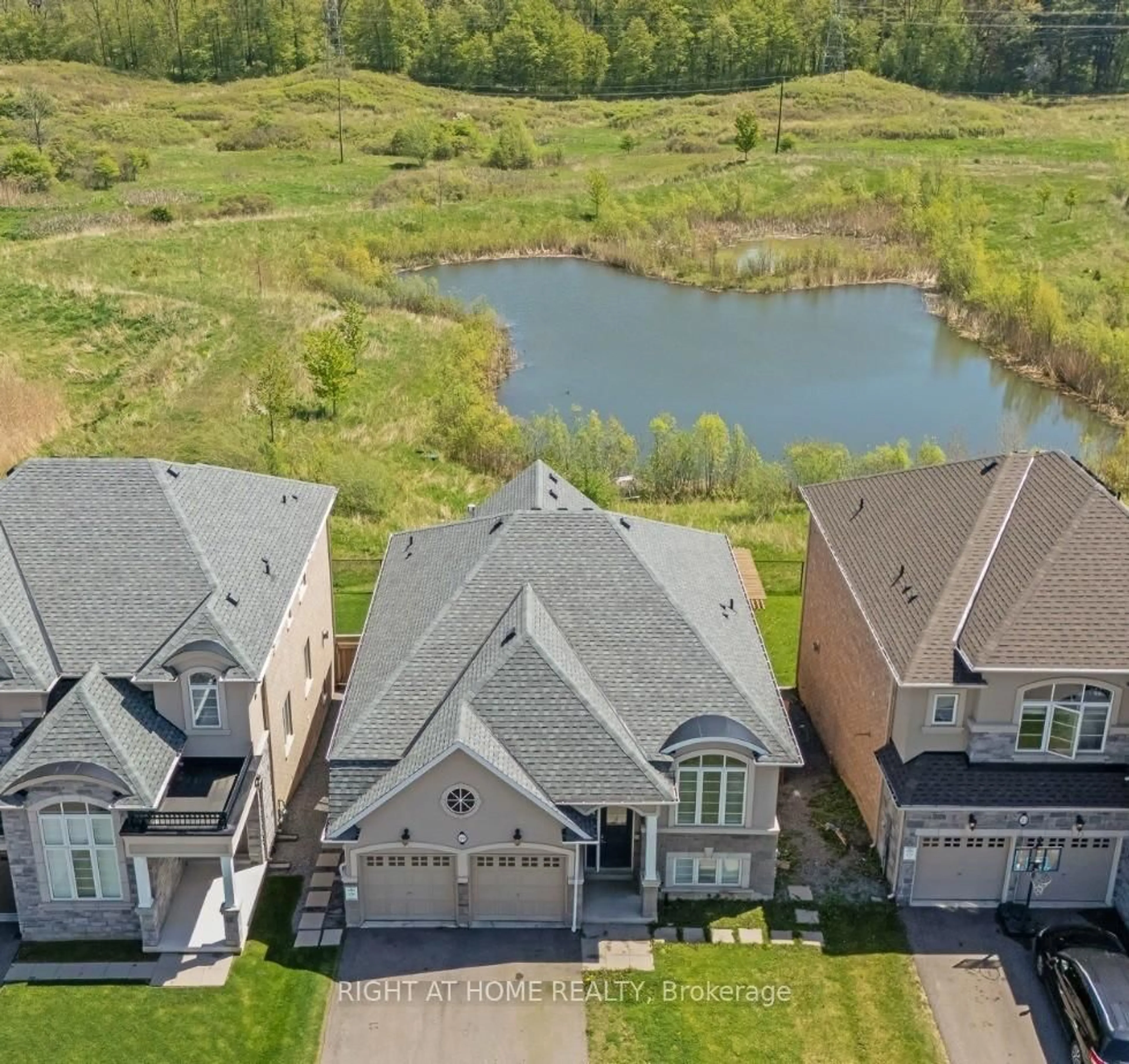 A pic from outside/outdoor area/front of a property/back of a property/a pic from drone, water/lake/river/ocean view for 19 Robarts Dr, Hamilton Ontario L9K 0H5