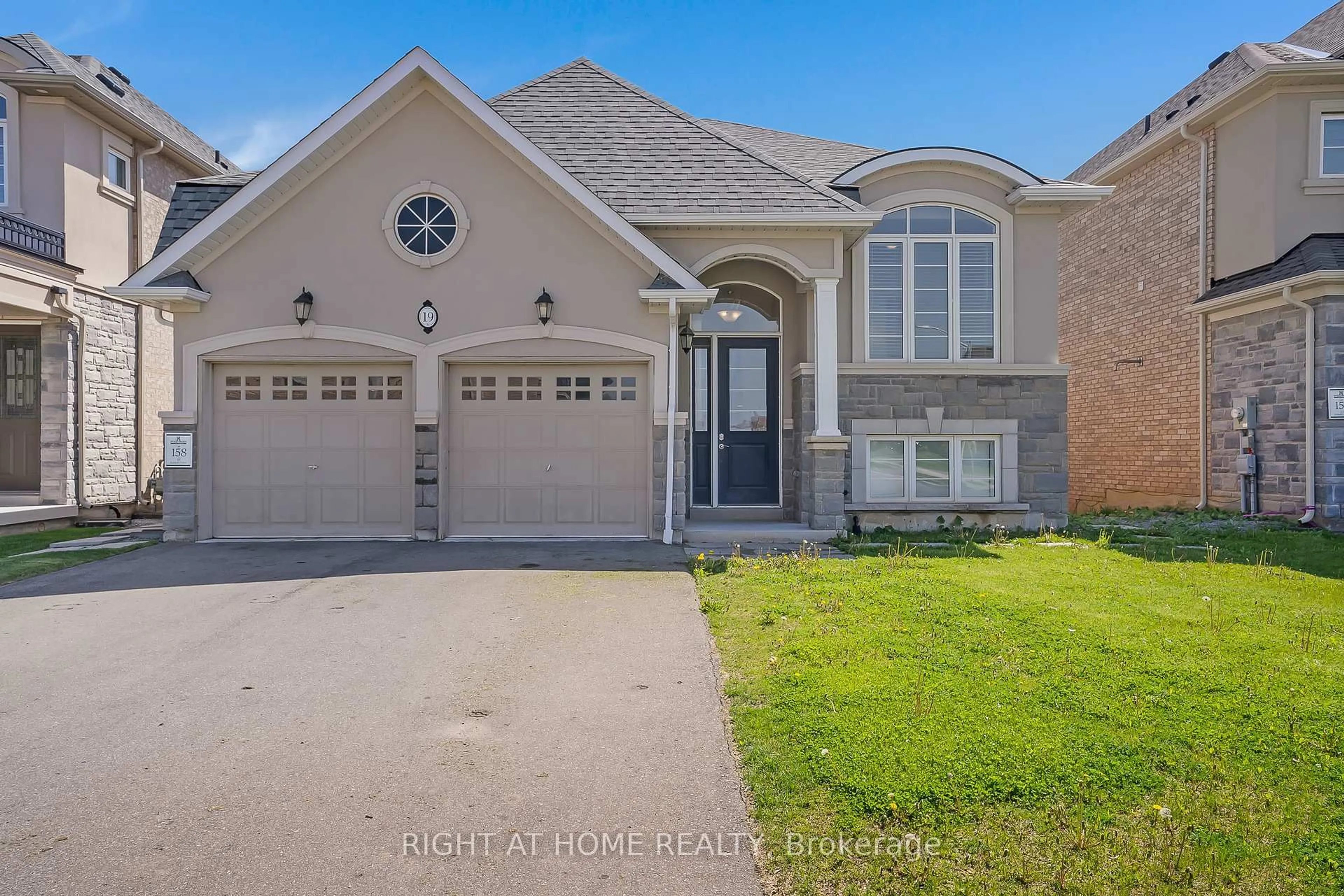Home with brick exterior material, street for 19 Robarts Dr, Hamilton Ontario L9K 0H5