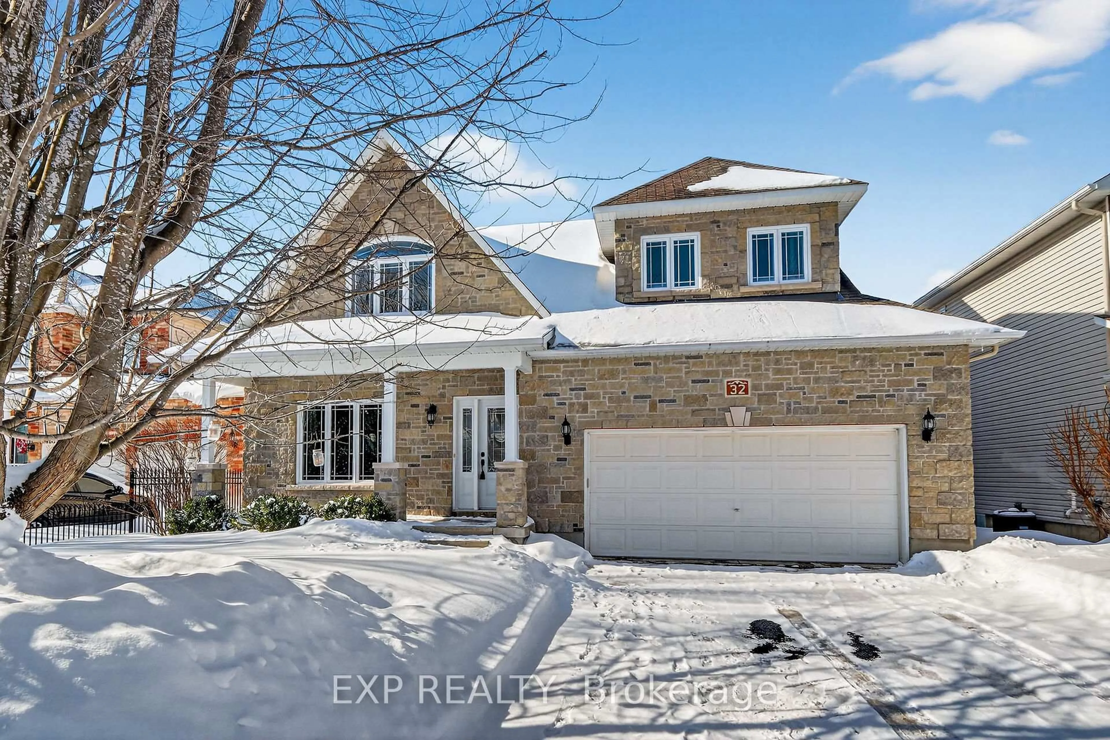 Home with brick exterior material, street for 32 Olde Towne. Ave, Russell Ontario K4R 0A5