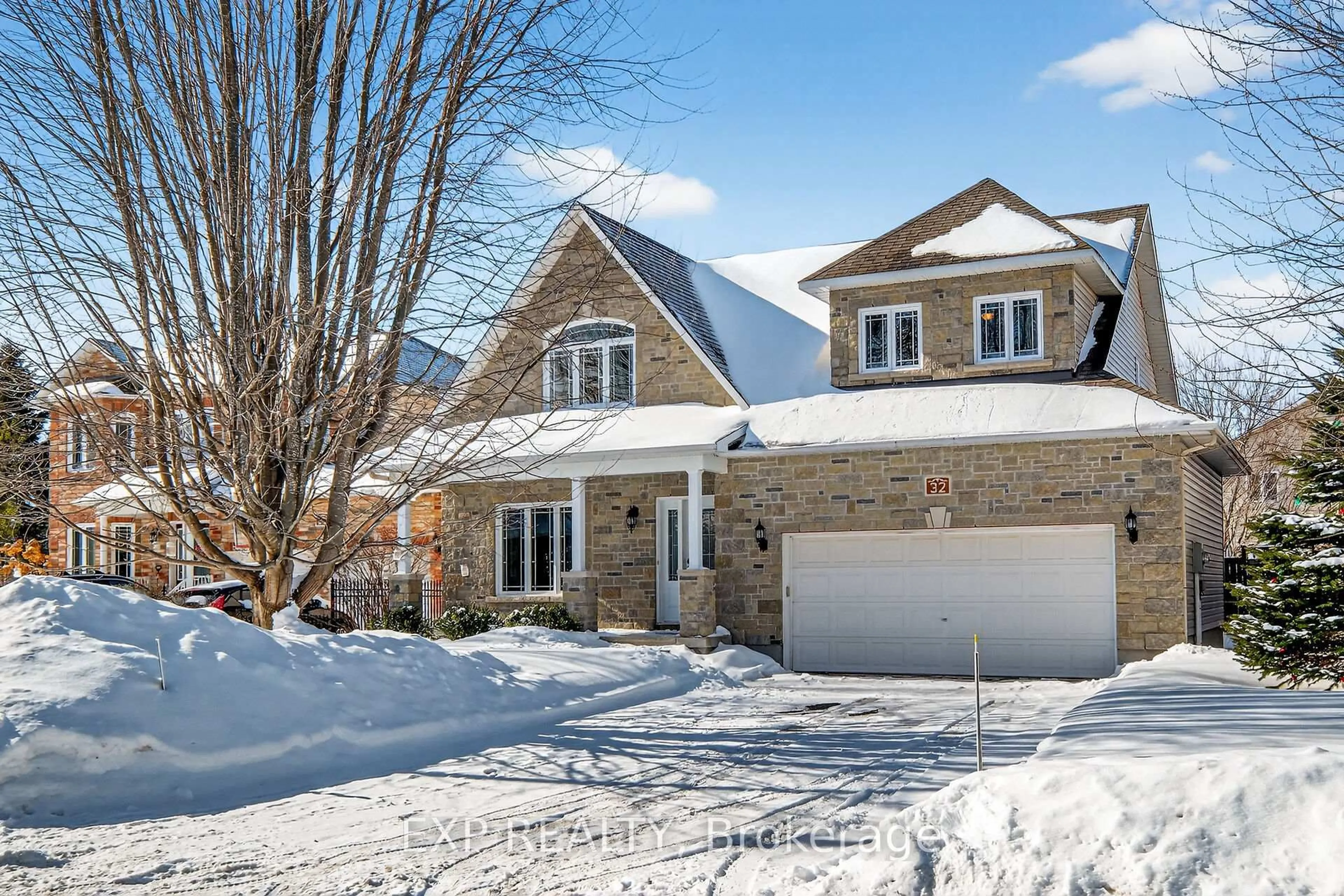 Home with brick exterior material, street for 32 Olde Towne. Ave, Russell Ontario K4R 0A5