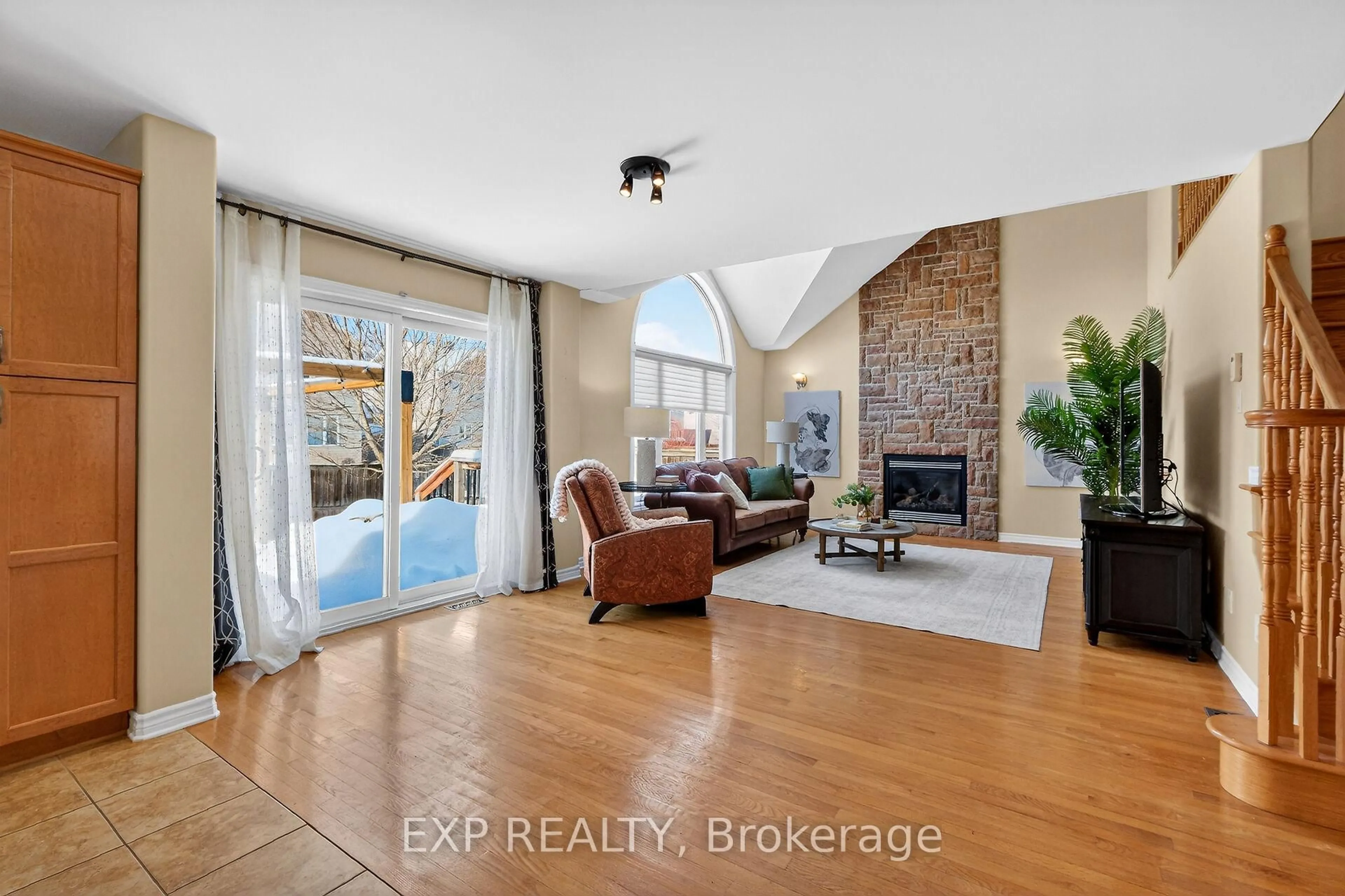 Living room with furniture, ceramic/tile floor for 32 Olde Towne. Ave, Russell Ontario K4R 0A5