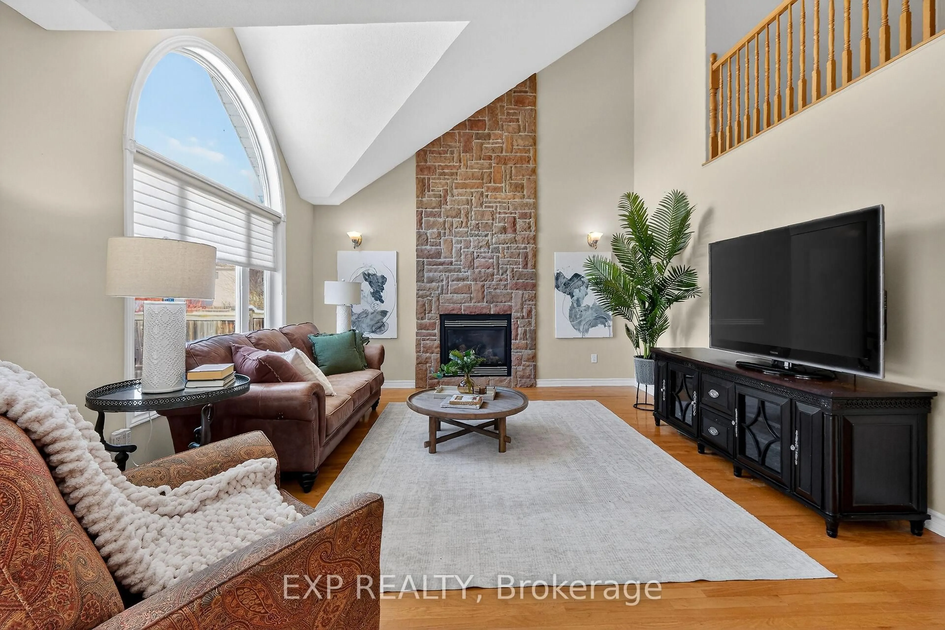 Living room with furniture, ceramic/tile floor for 32 Olde Towne. Ave, Russell Ontario K4R 0A5