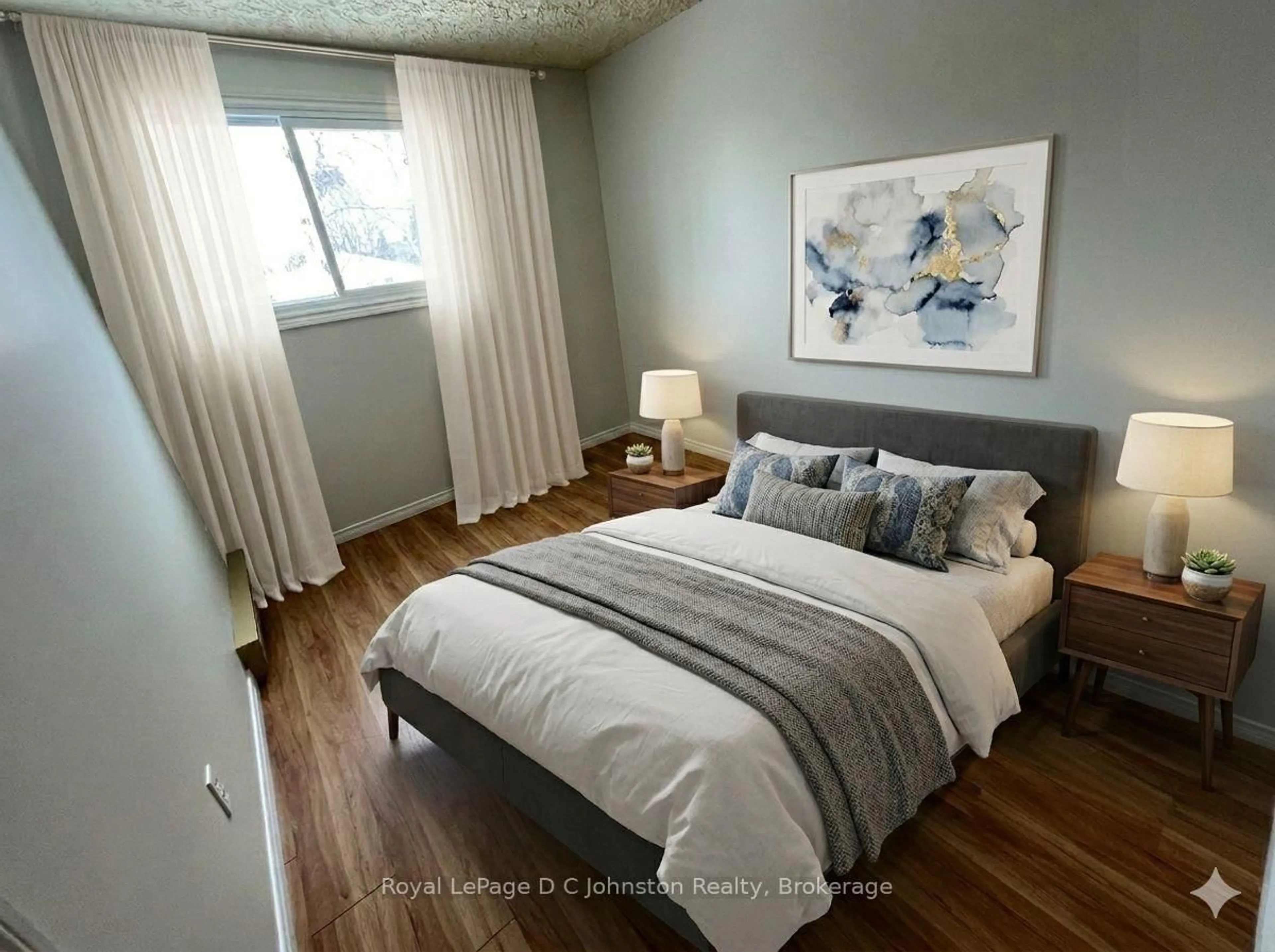 Bedroom with bed, wood/laminate floor for 229 Adelaide St #306, Saugeen Shores Ontario N0H 2L0