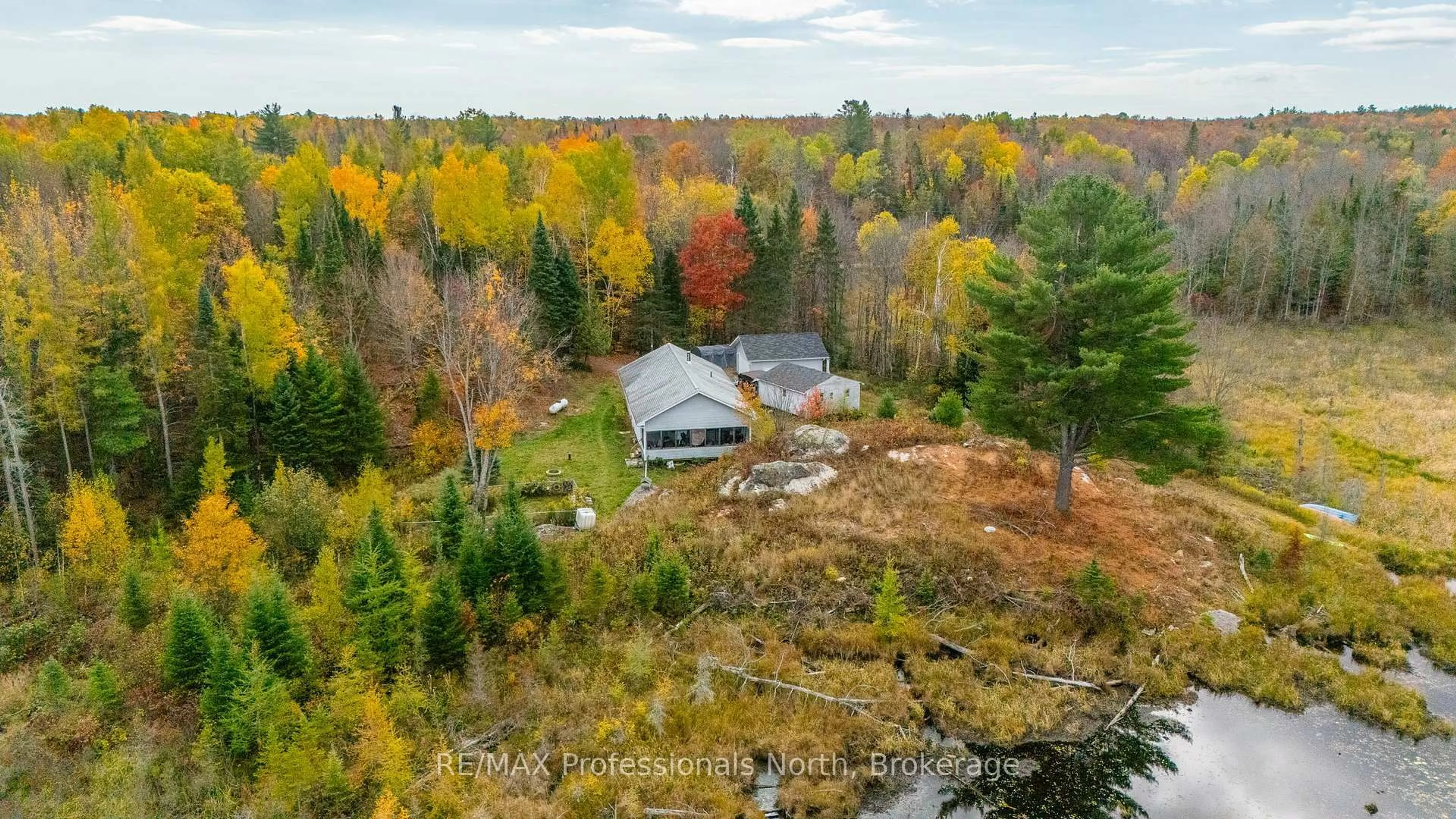 A pic from outside/outdoor area/front of a property/back of a property/a pic from drone, water/lake/river/ocean view for 2179 South Lake Rd, Minden Hills Ontario K0M 2K0