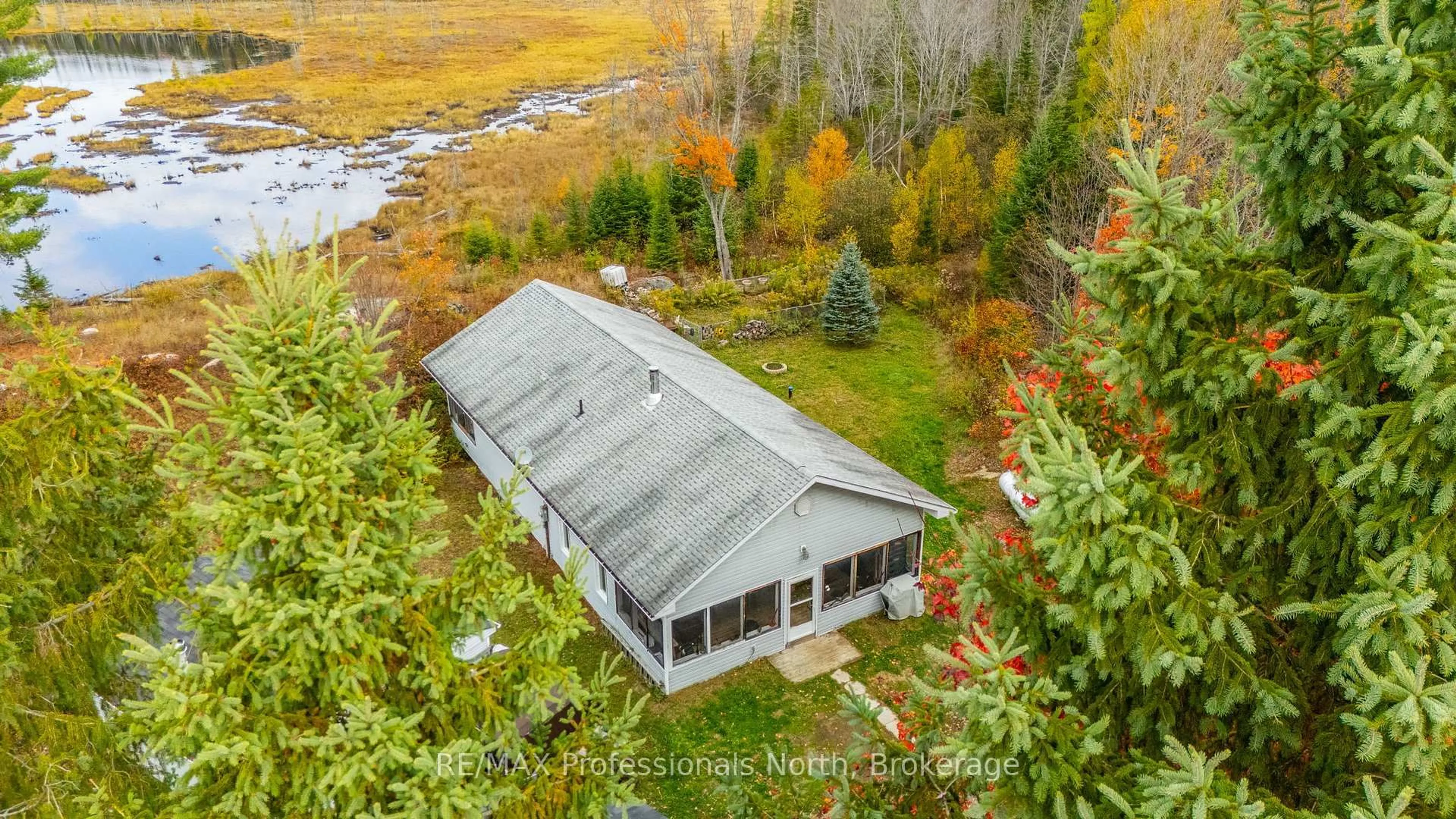 A pic from outside/outdoor area/front of a property/back of a property/a pic from drone, unknown for 2179 South Lake Rd, Minden Hills Ontario K0M 2K0