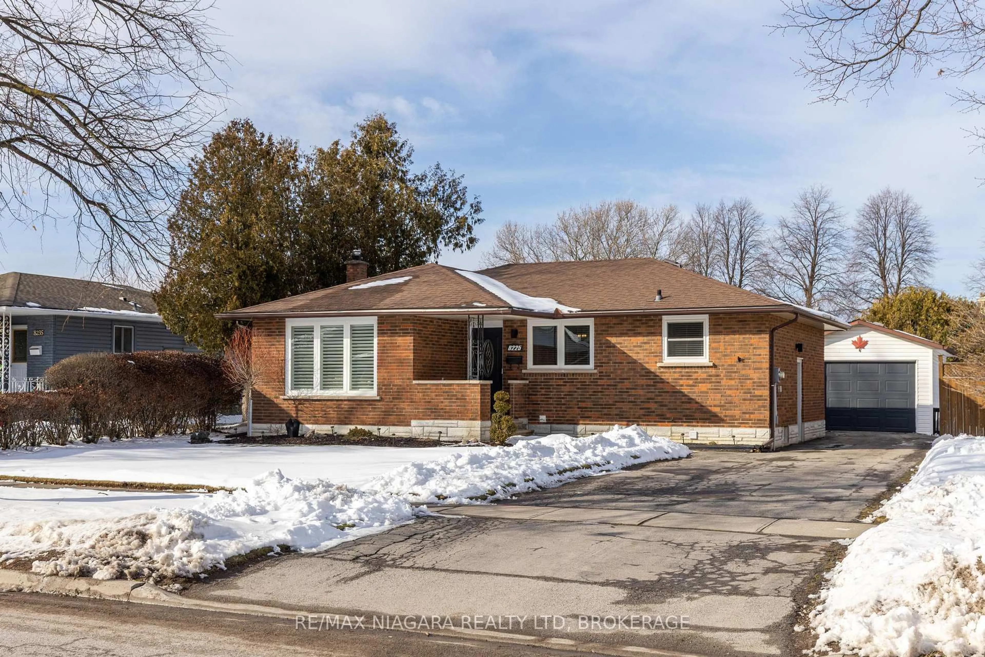 Home with brick exterior material, street for 8225 Paddock Trail Dr, Niagara Falls Ontario L2H 1X1