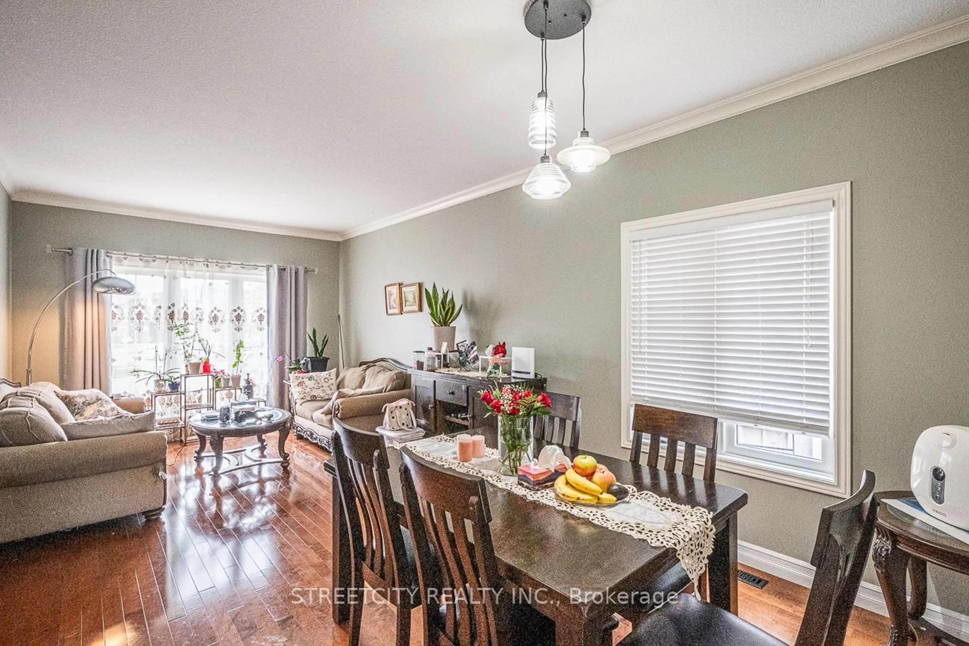 Dining room, wood/laminate floor for 1366 Kains Woods Terr, London South Ontario N6K 4Z7