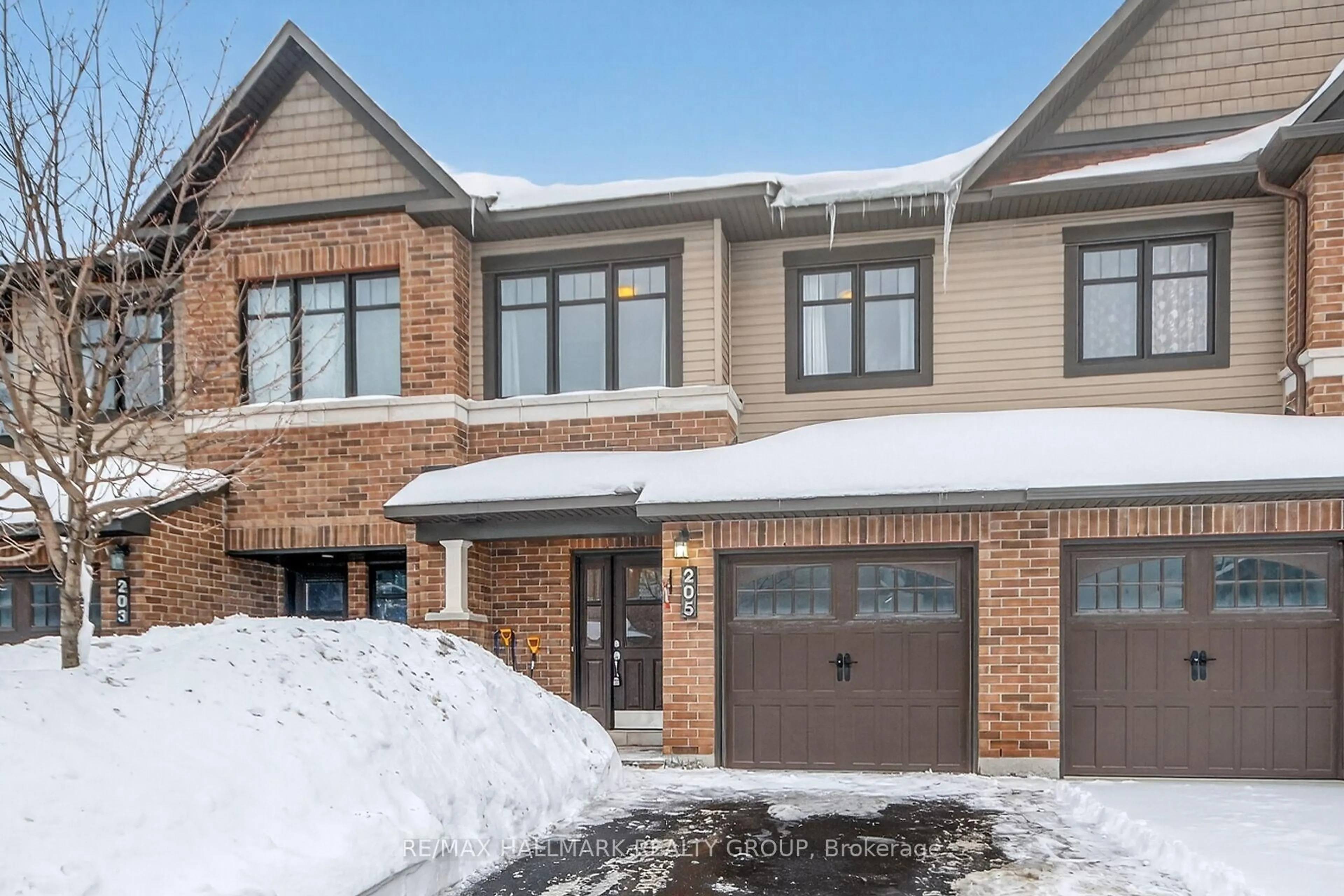 Home with brick exterior material, street for 205 Mancini Way, Ottawa Ontario K2J 5X4