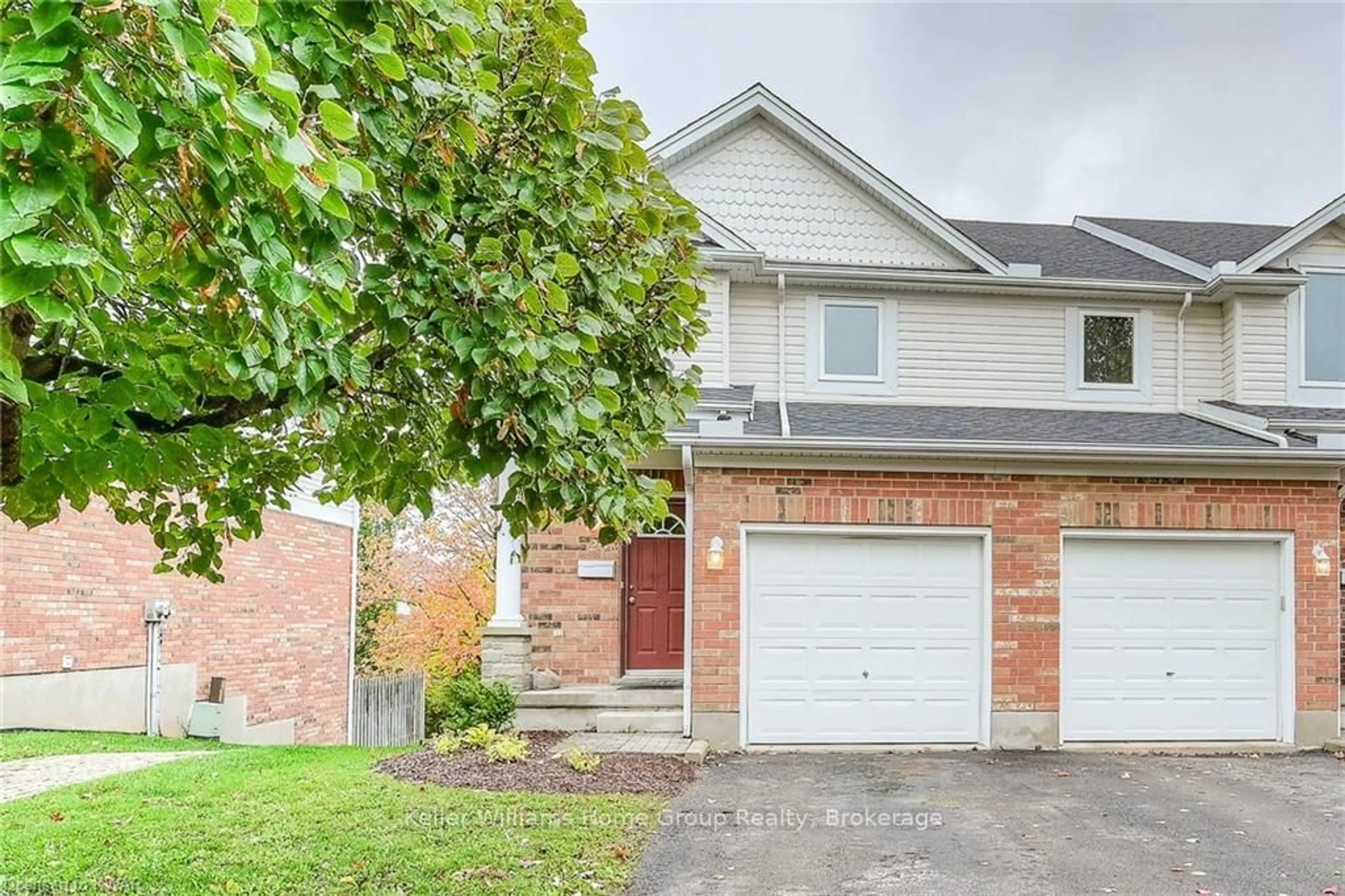 Home with brick exterior material, street for 151 Clairfields Dr #23, Guelph Ontario N1L 1P5
