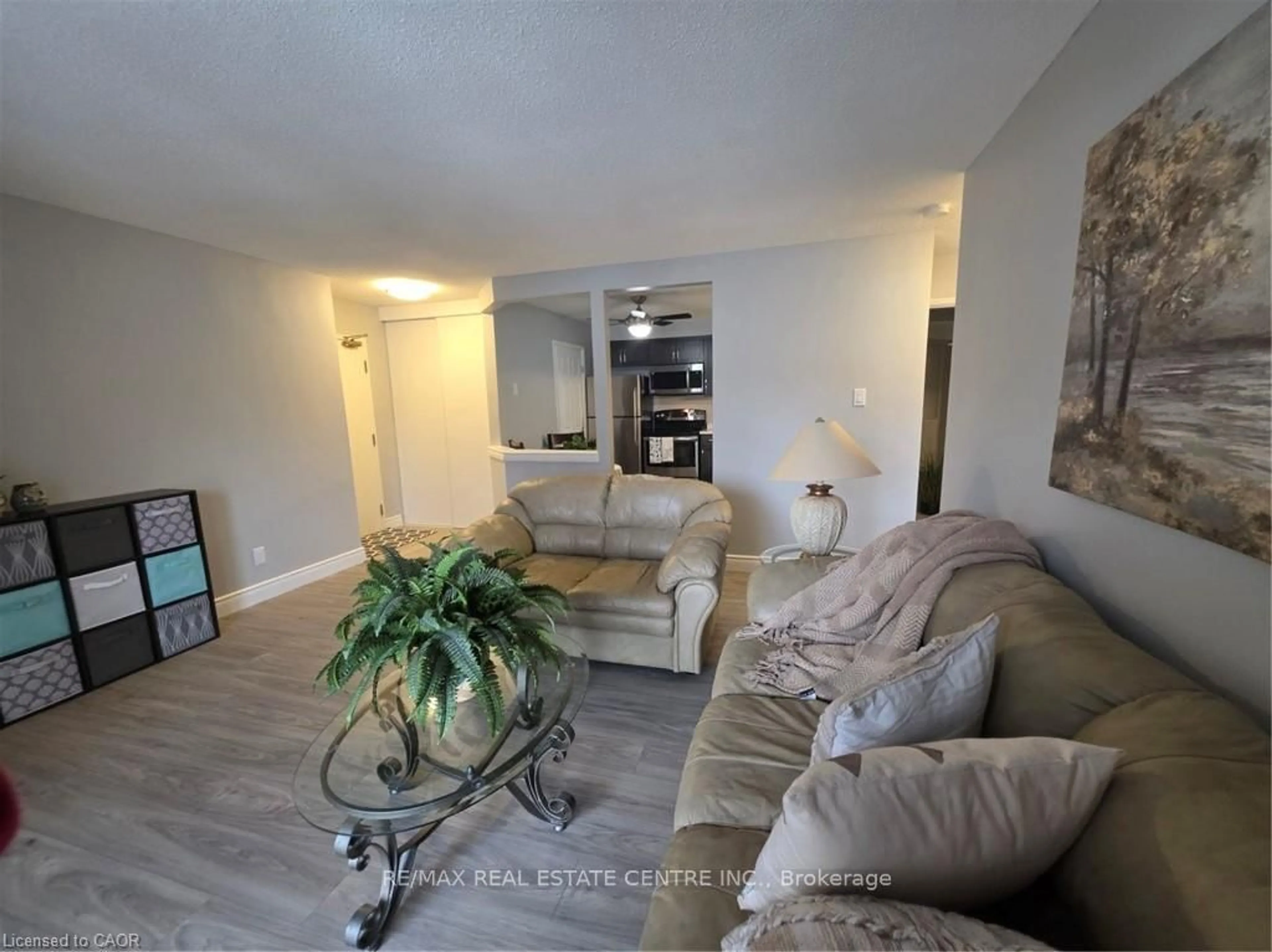 Living room with furniture, unknown for 565 Greenfield Ave #106, Kitchener Ontario N2C 2P3