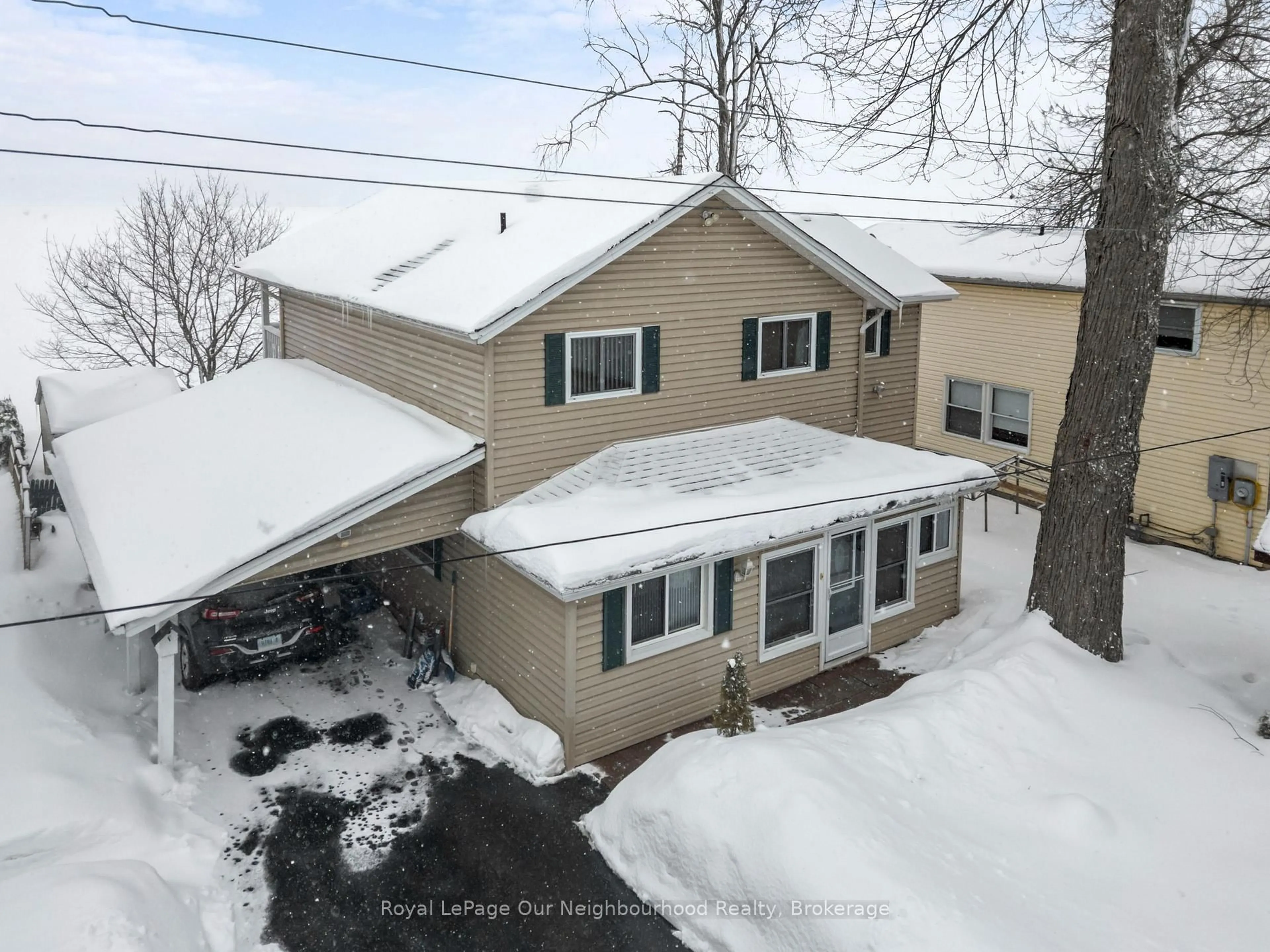 A pic from outside/outdoor area/front of a property/back of a property/a pic from drone, street for 465 Causeway View Rd, Selwyn Ontario K0L 1T0