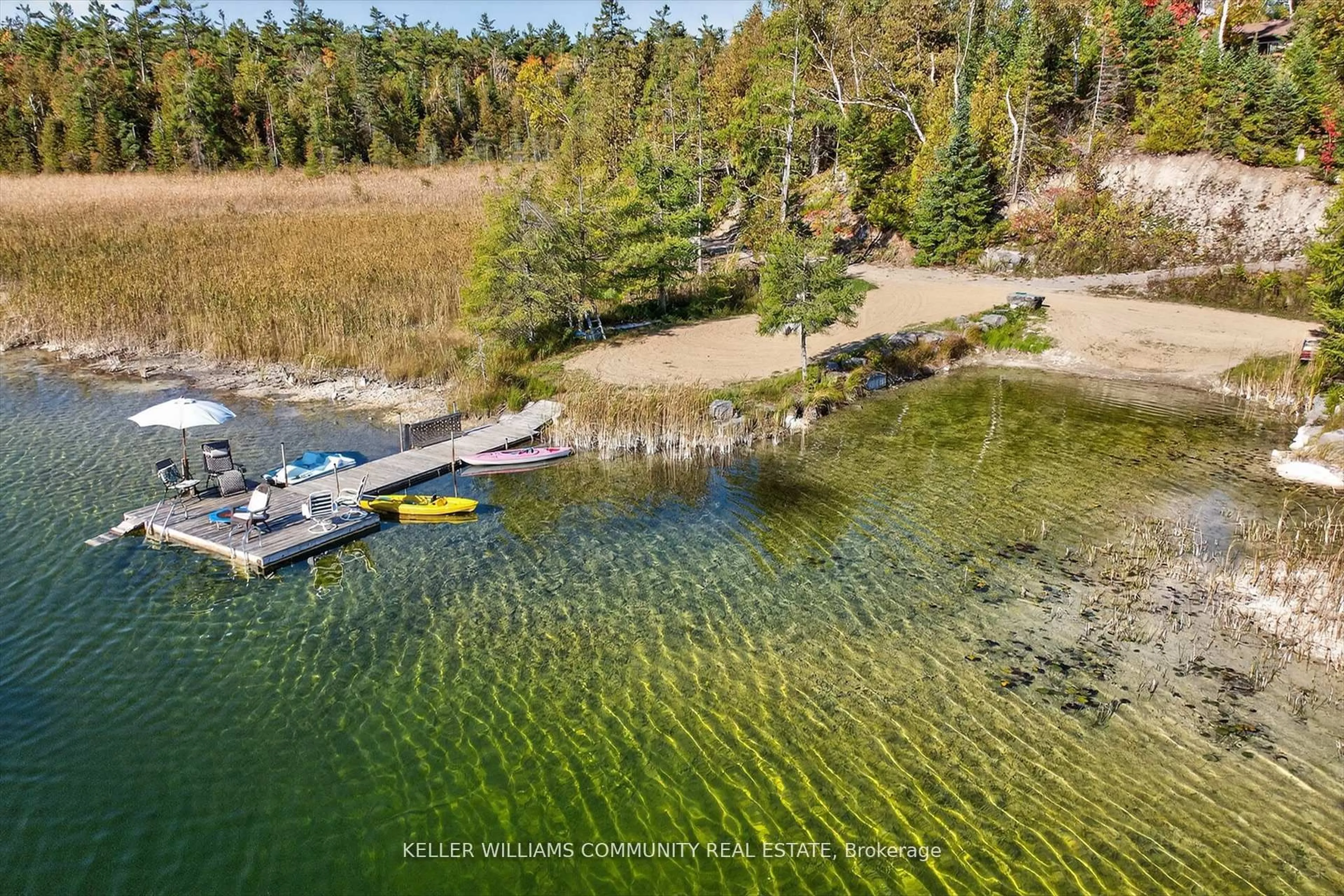 A pic from outside/outdoor area/front of a property/back of a property/a pic from drone, water/lake/river/ocean view for 1352 County Rd 49 Rd, Trent Lakes Ontario K0M 1A0