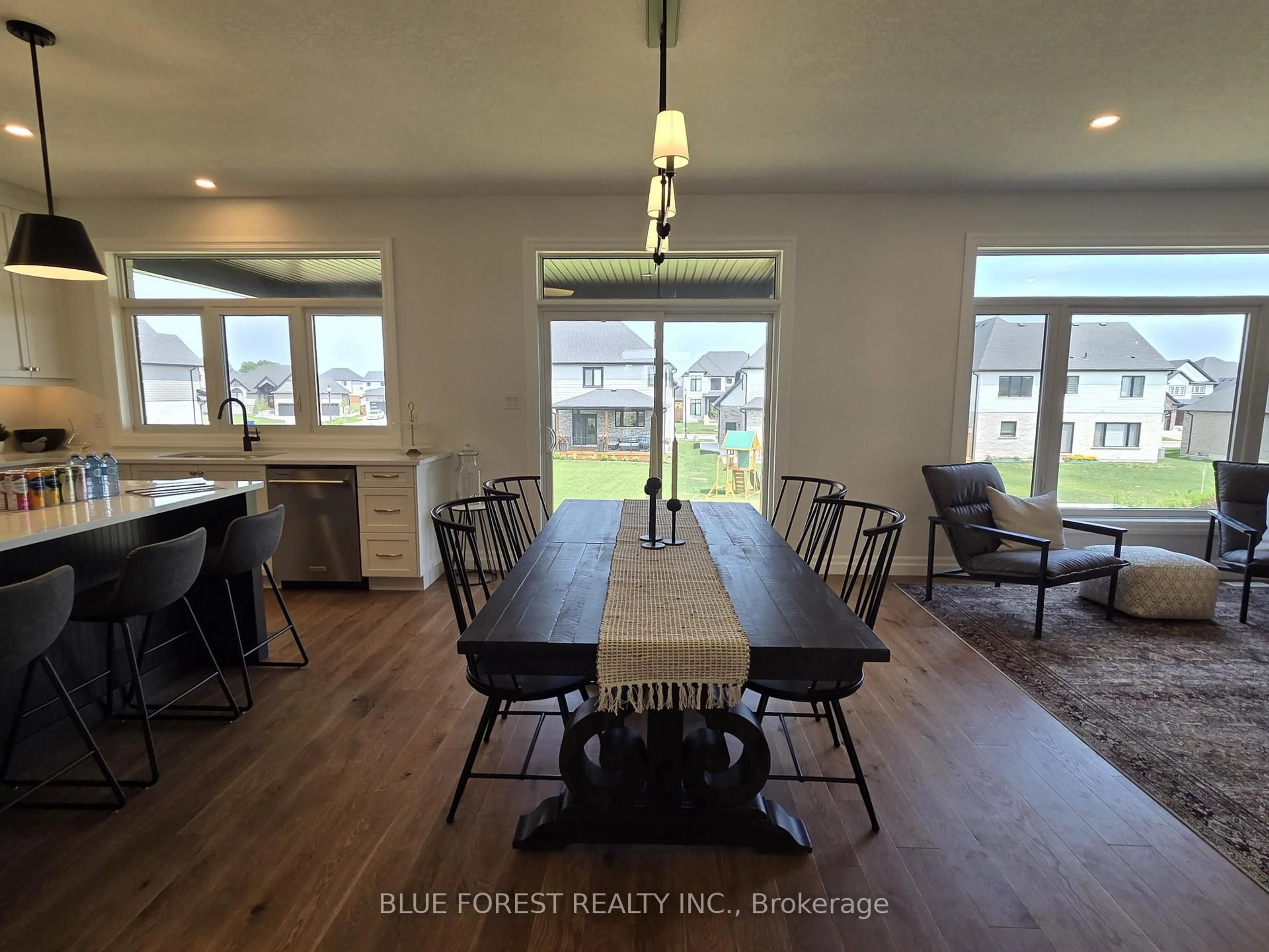 Dining room, wood/laminate floor for 230 Harvest Lane, Thames Centre Ontario N0L 1G2