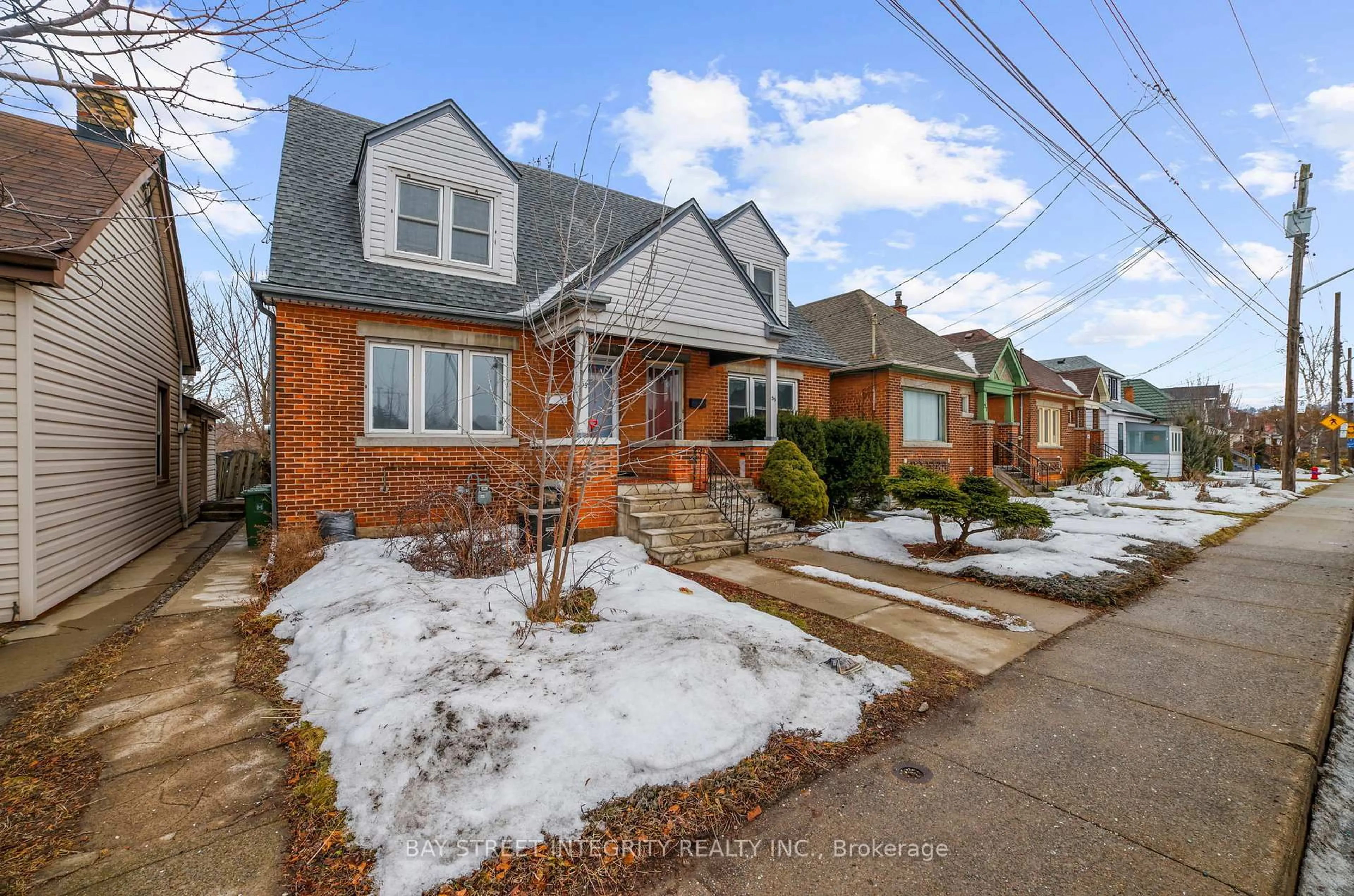 Home with brick exterior material, street for 53 Paradise Rd, Hamilton Ontario L8S 1S3