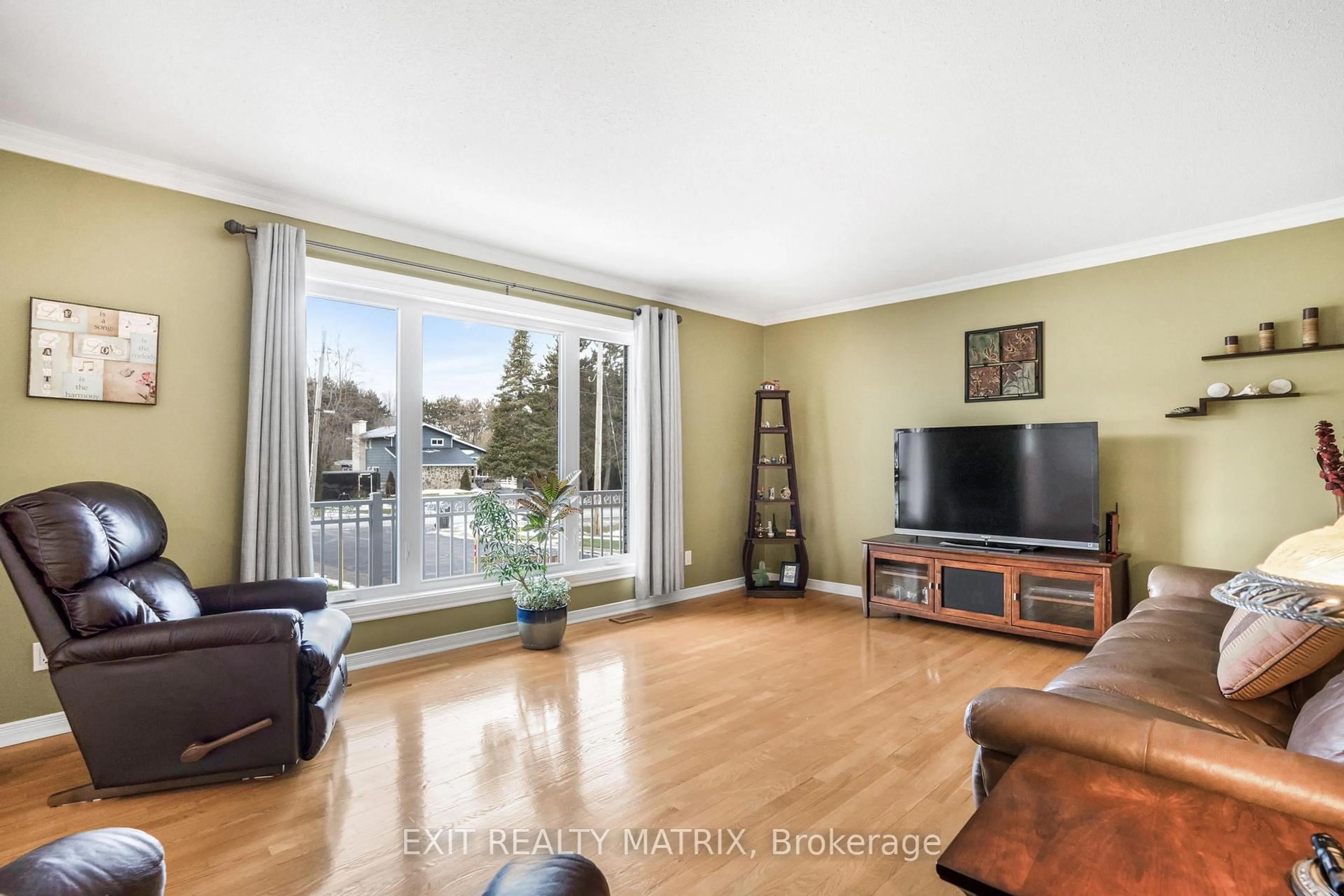 Living room with furniture, wood/laminate floor for 165 Eliza St, Champlain Ontario K0B 1K0