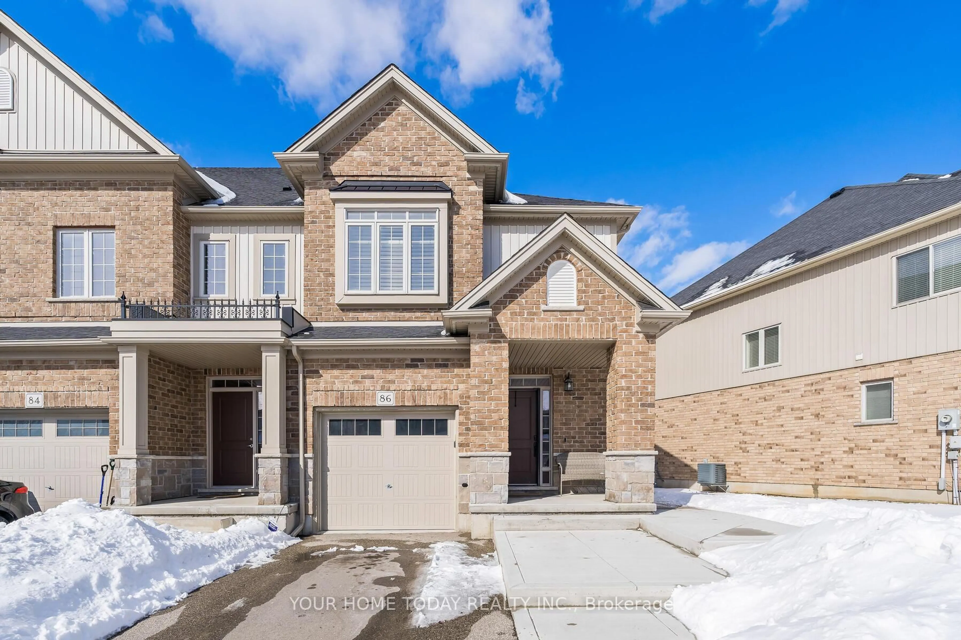 Home with brick exterior material, street for 86 Pettitt Dr, Guelph Ontario N1E 0M2