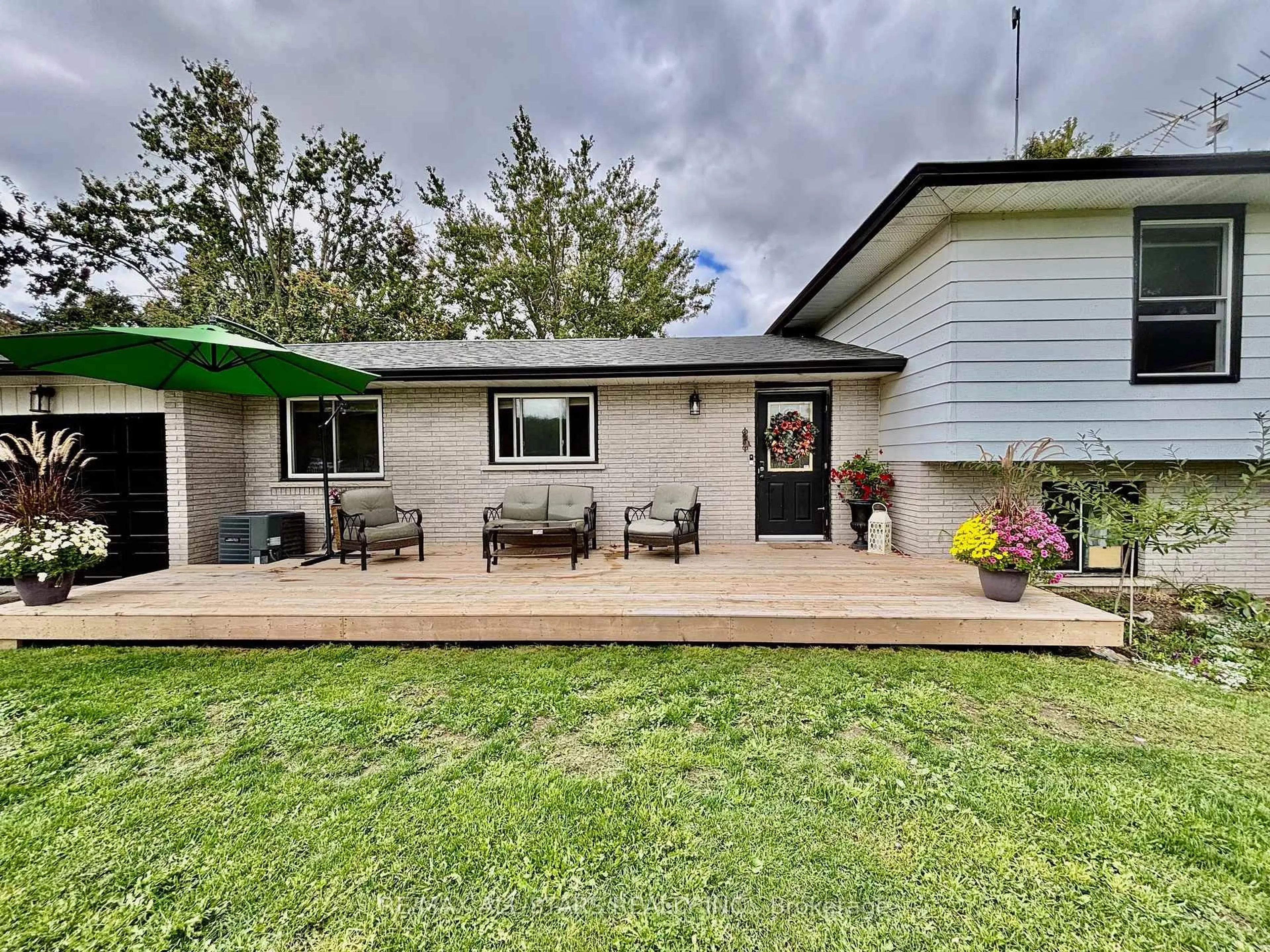 Home with vinyl exterior material, street for 375 Ogemah Rd, Kawartha Lakes Ontario K0M 2C0